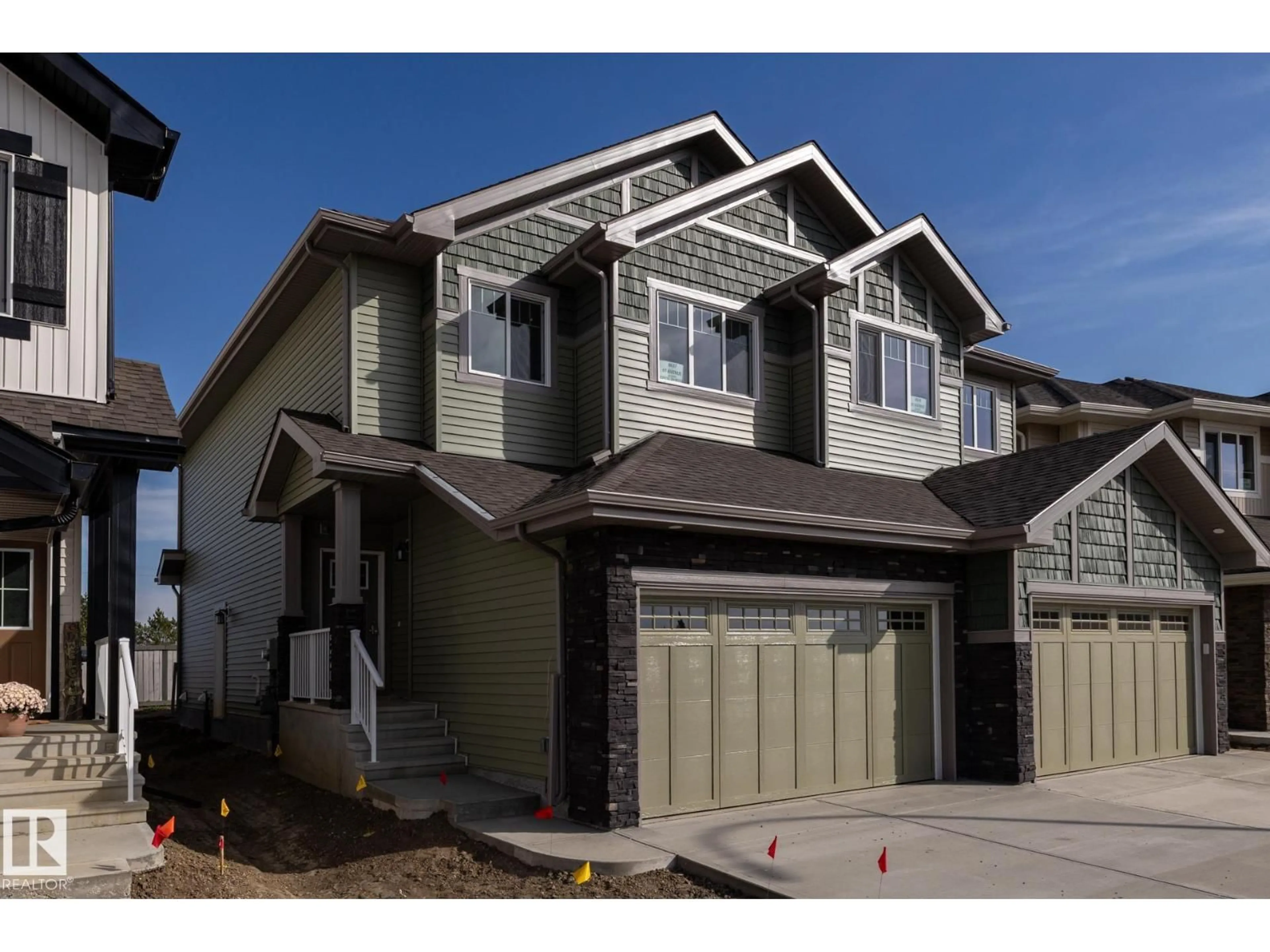 Home with vinyl exterior material, street for 8637 97 AV, Morinville Alberta T8R2S1