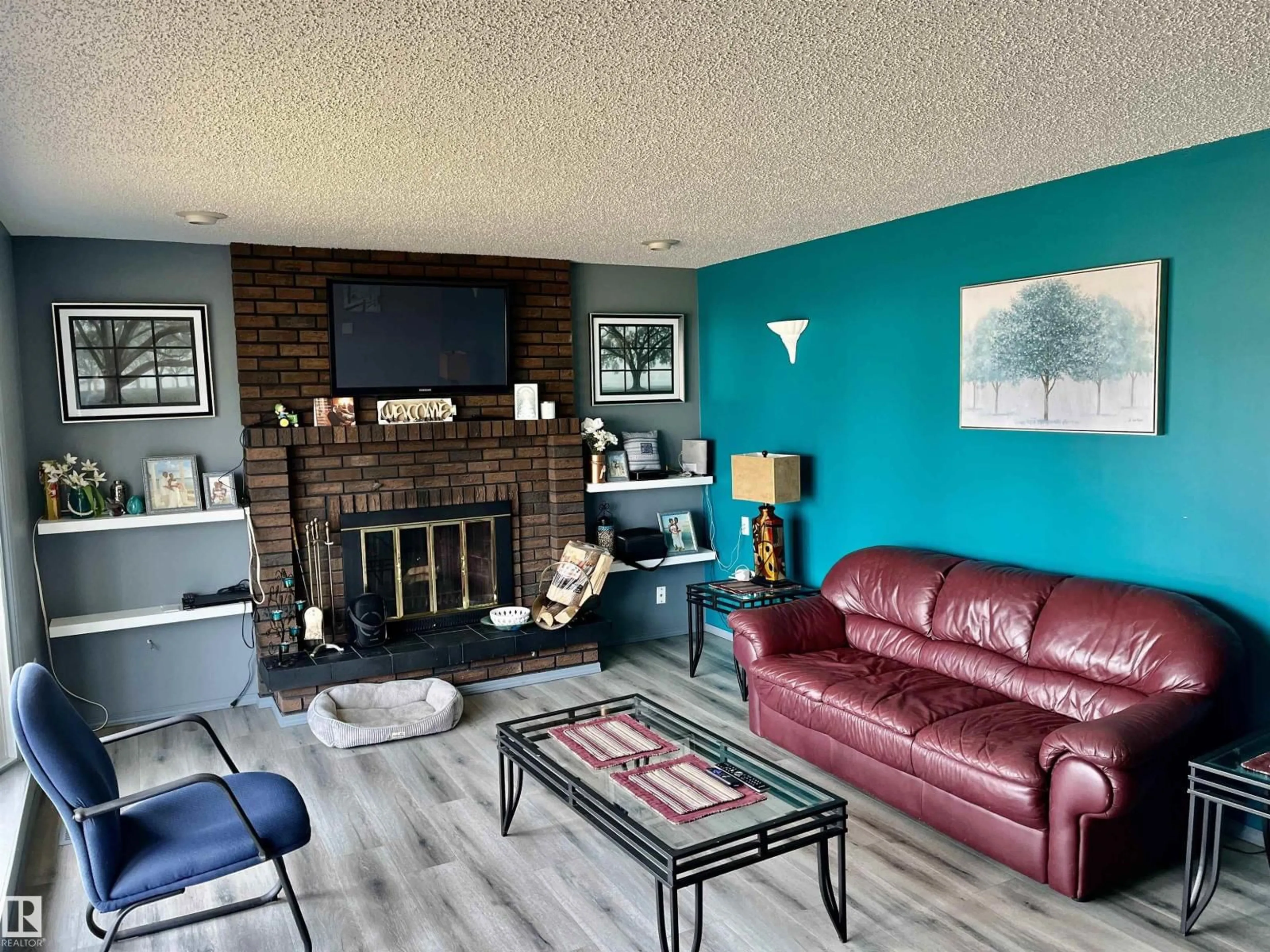 Living room with furniture, wood/laminate floor for 4505 55 AV, Smoky Lake Town Alberta T0Z3C0