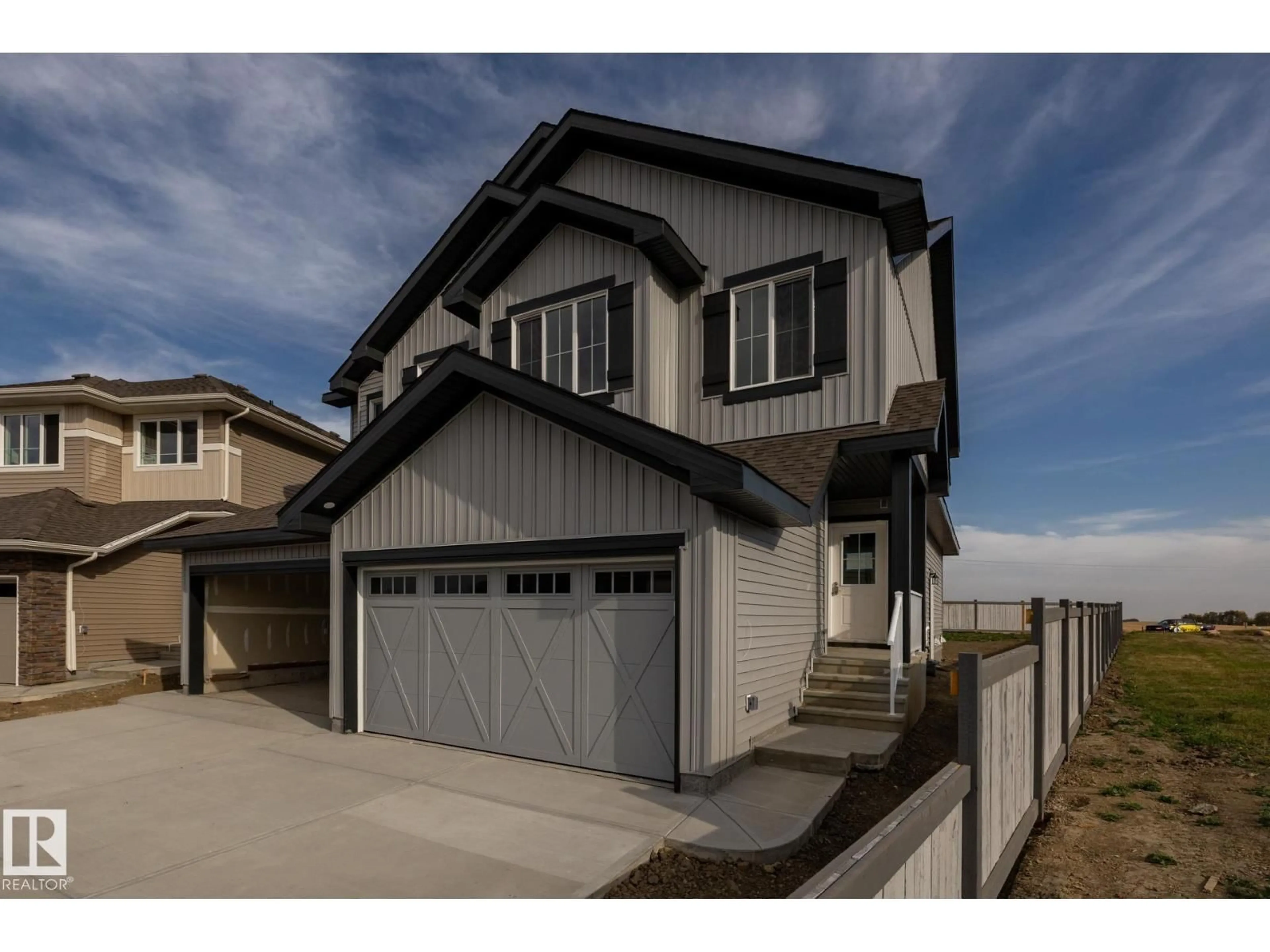 Home with vinyl exterior material, street for 8647 97 AV, Morinville Alberta T8R2S1