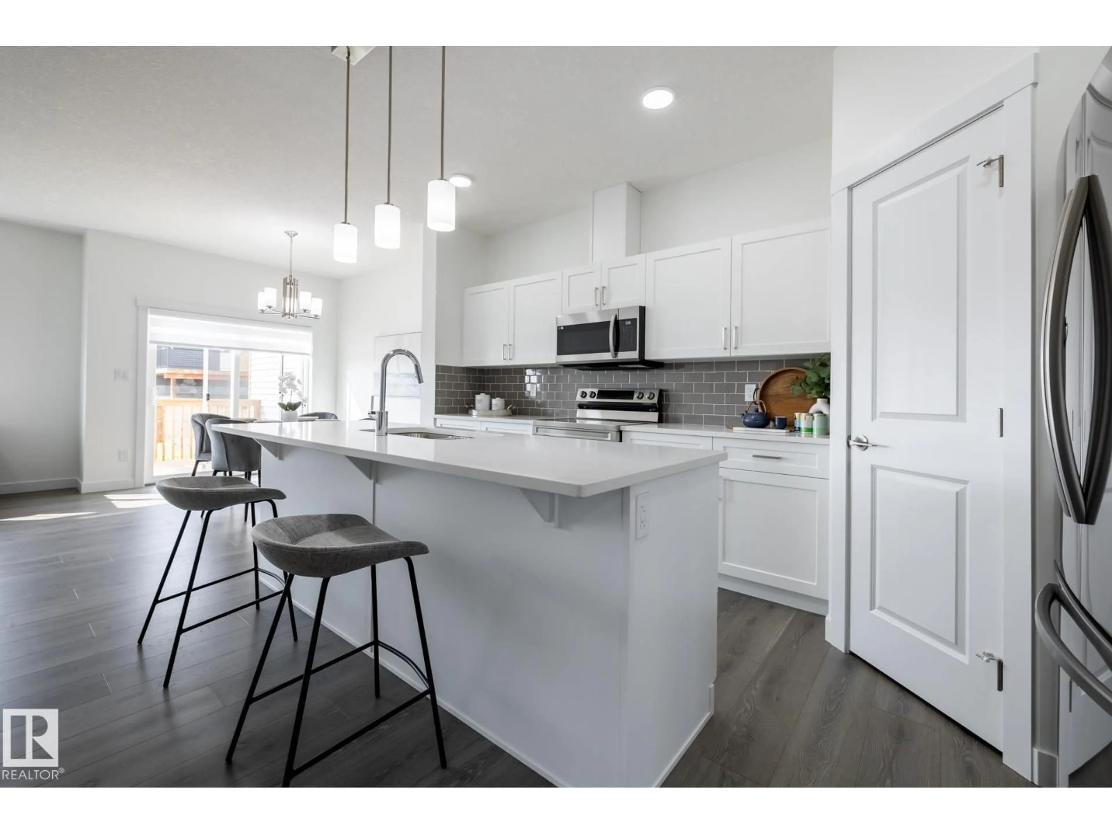 Open concept kitchen, unknown for 8647 97 AV, Morinville Alberta T8R2S1