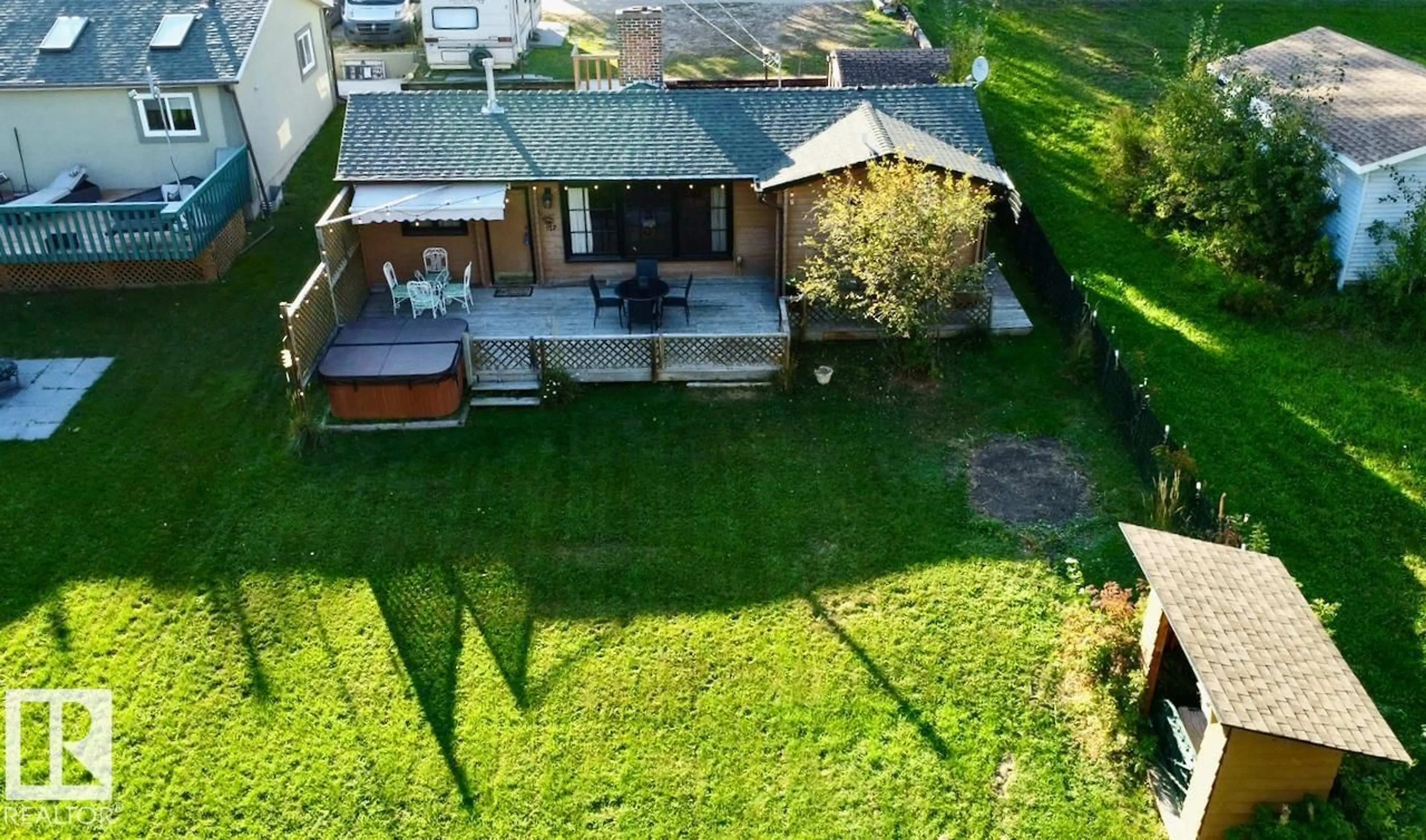 A pic from outside/outdoor area/front of a property/back of a property/a pic from drone, unknown for S - 912 1 AV, Rural Parkland County Alberta T0E2B0