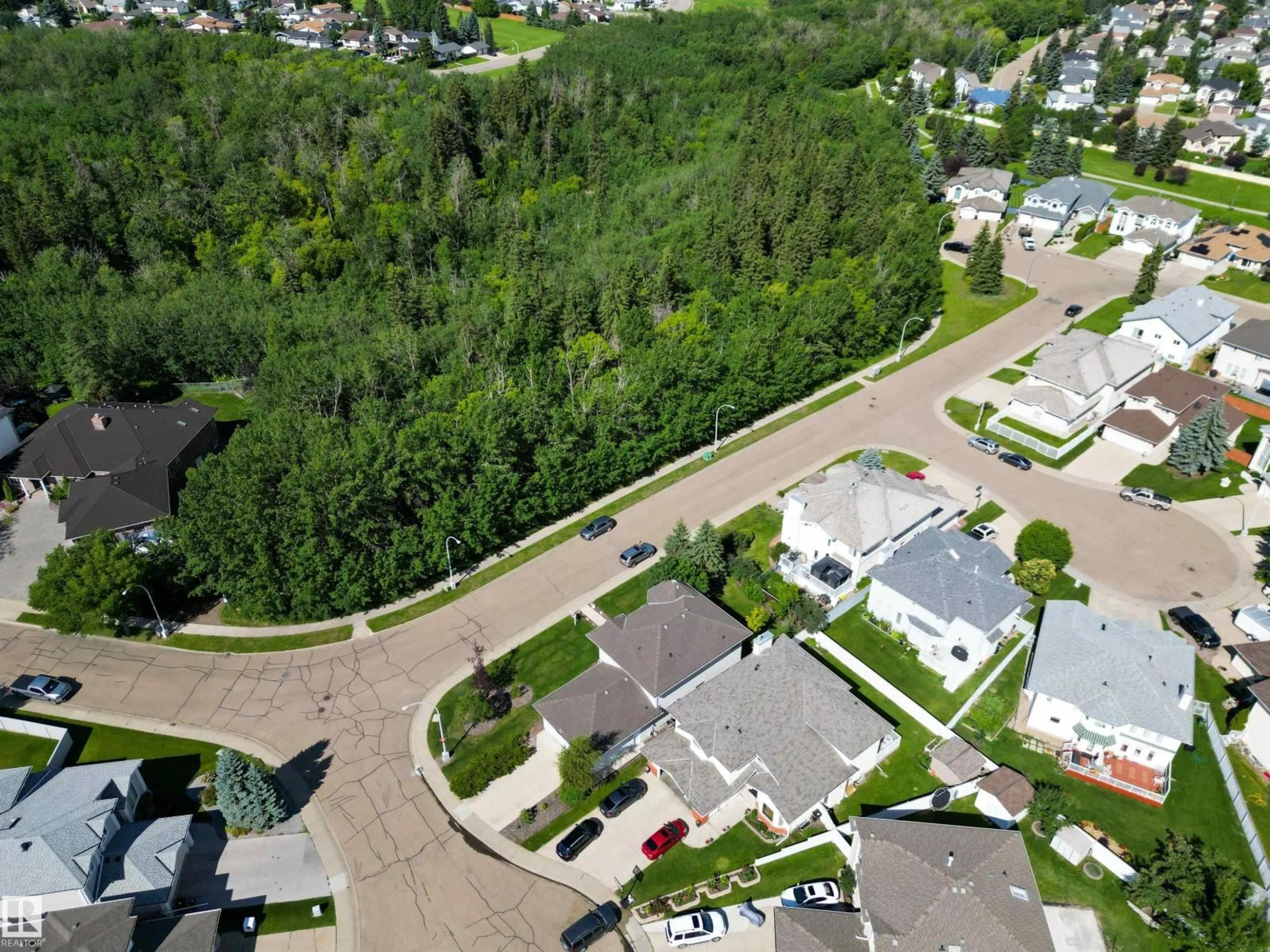 A pic from outside/outdoor area/front of a property/back of a property/a pic from drone, street for 133 KULAWY DR, Edmonton Alberta T6L6T9