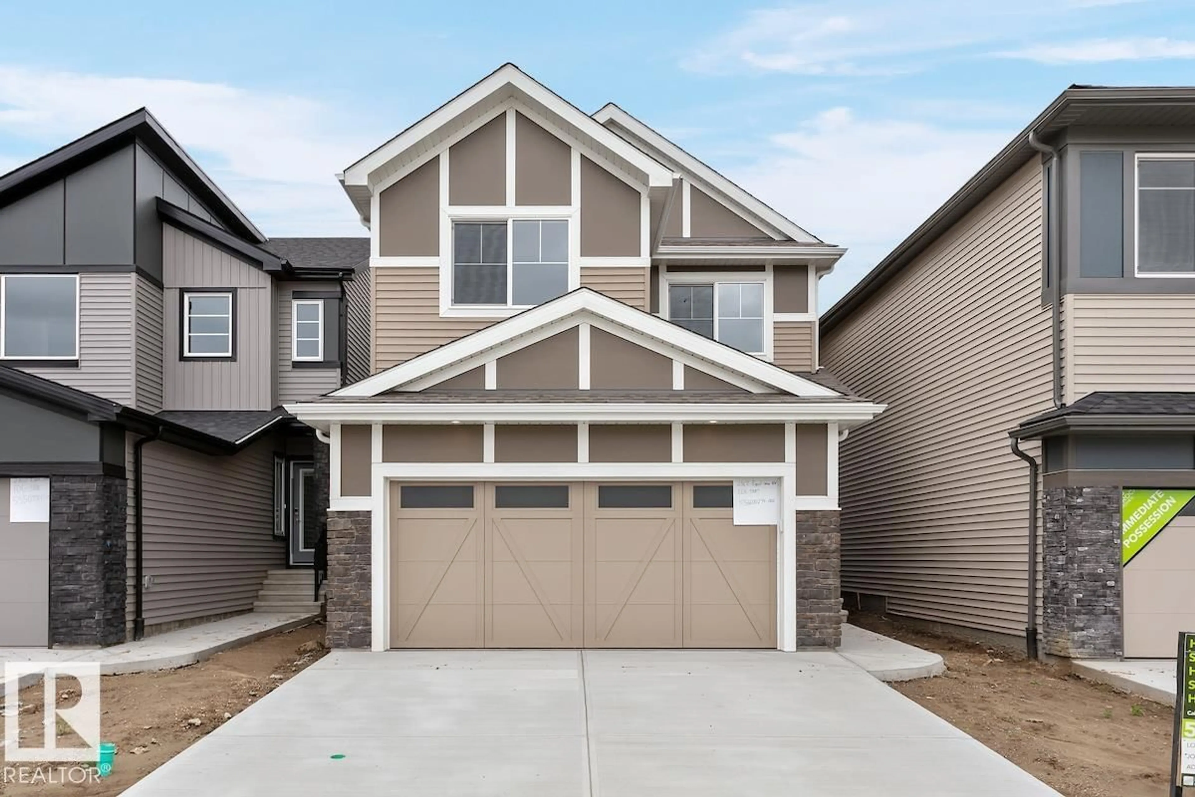 Home with vinyl exterior material, street for 2367 EGRET WY, Edmonton Alberta T6M3G8