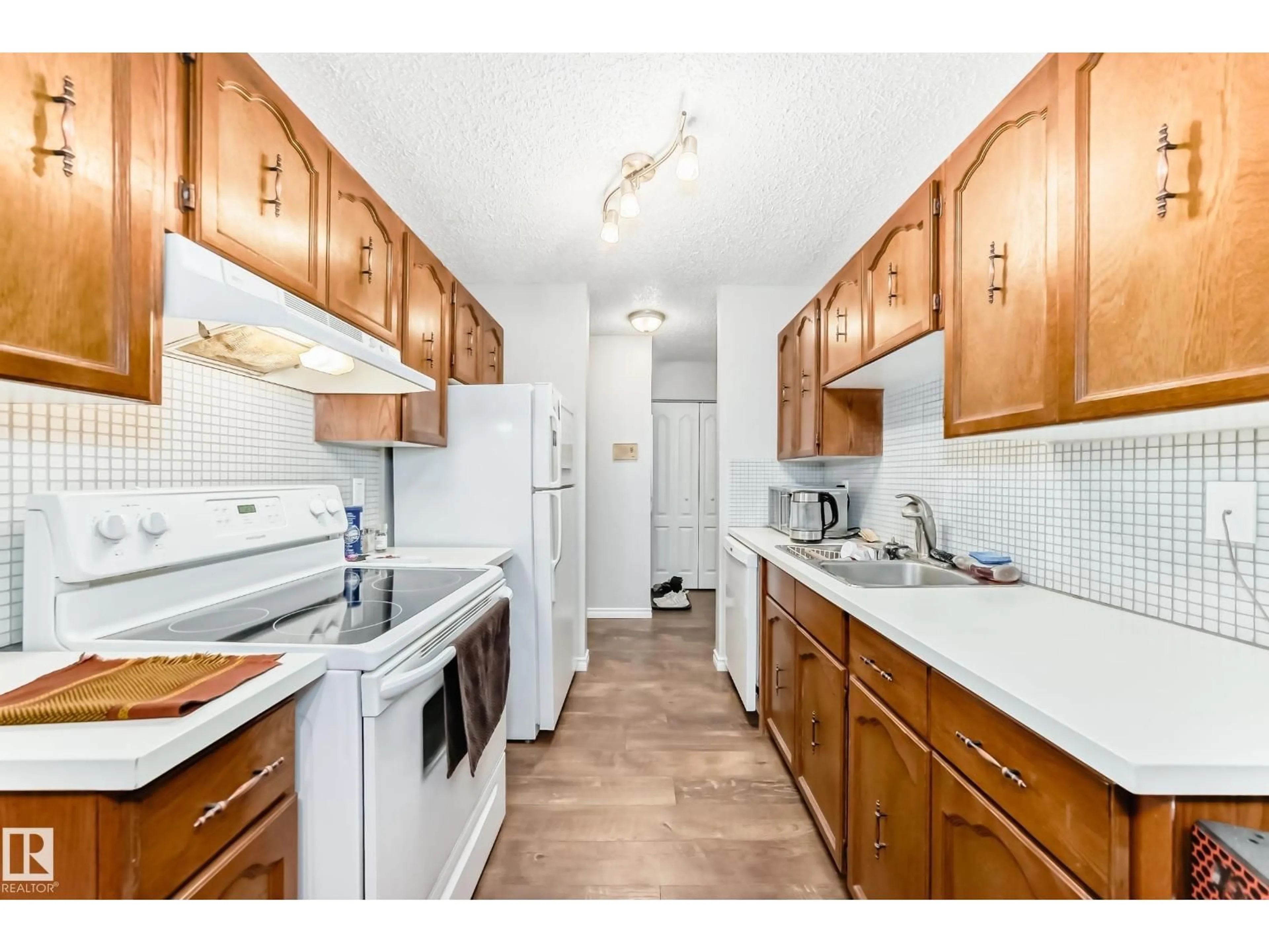 Standard kitchen, unknown for #305 - 14004 26 ST, Edmonton Alberta T5Y1Y4