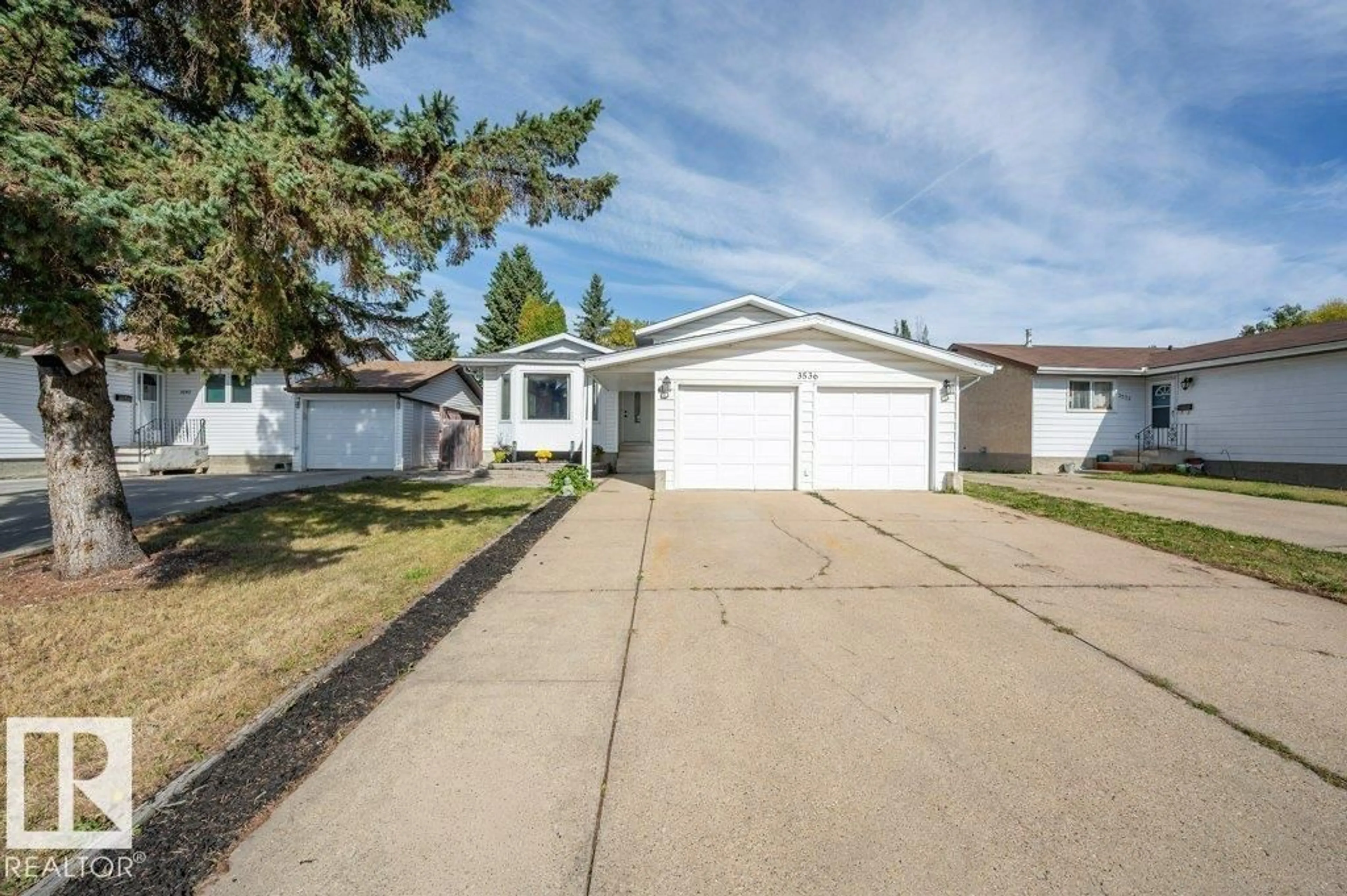 Home with vinyl exterior material, street for 3536 19 AV, Edmonton Alberta T6L2Z9