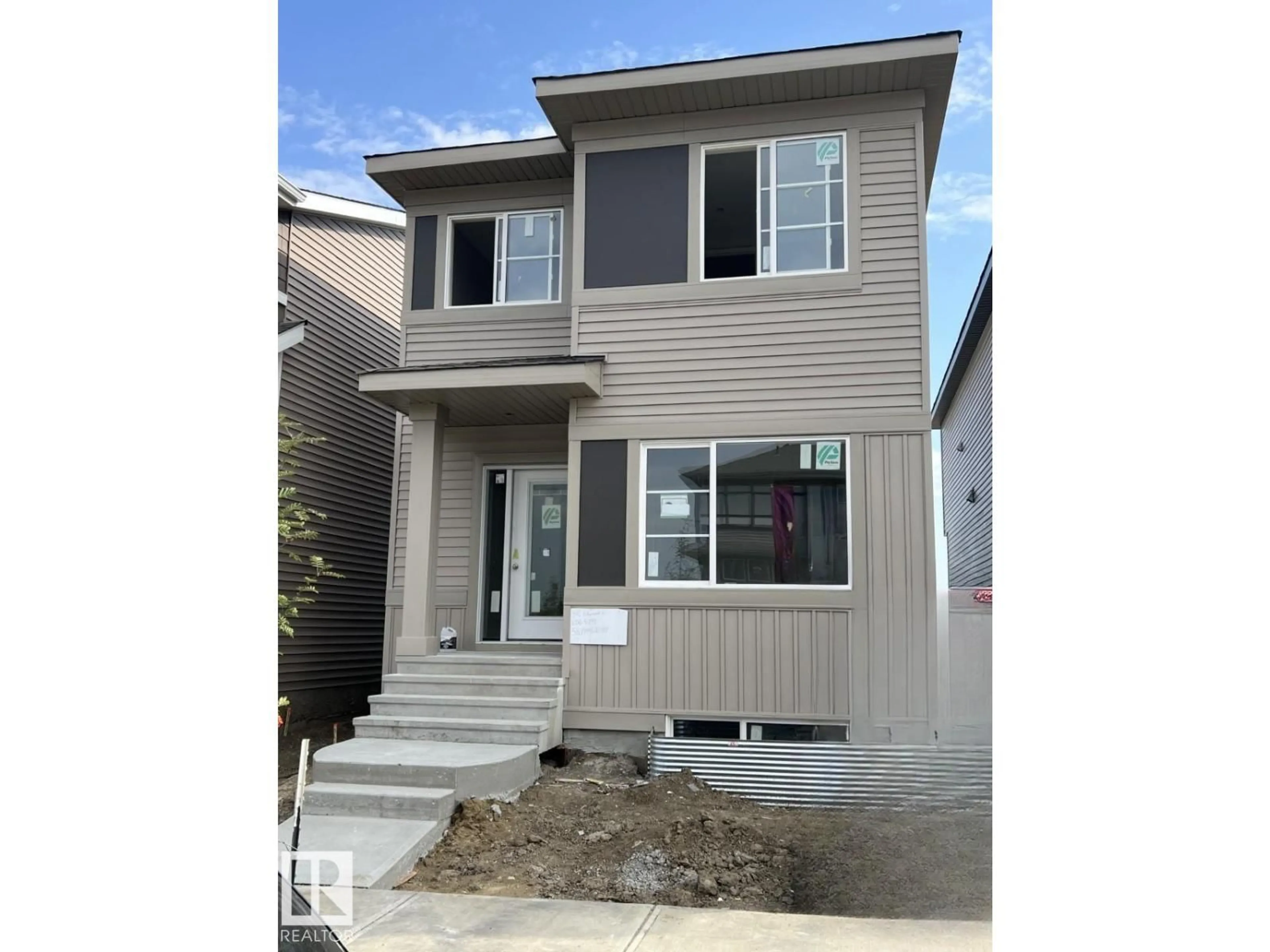 Home with vinyl exterior material, street for 341 EDGEMONT DR, Edmonton Alberta T6M3G7
