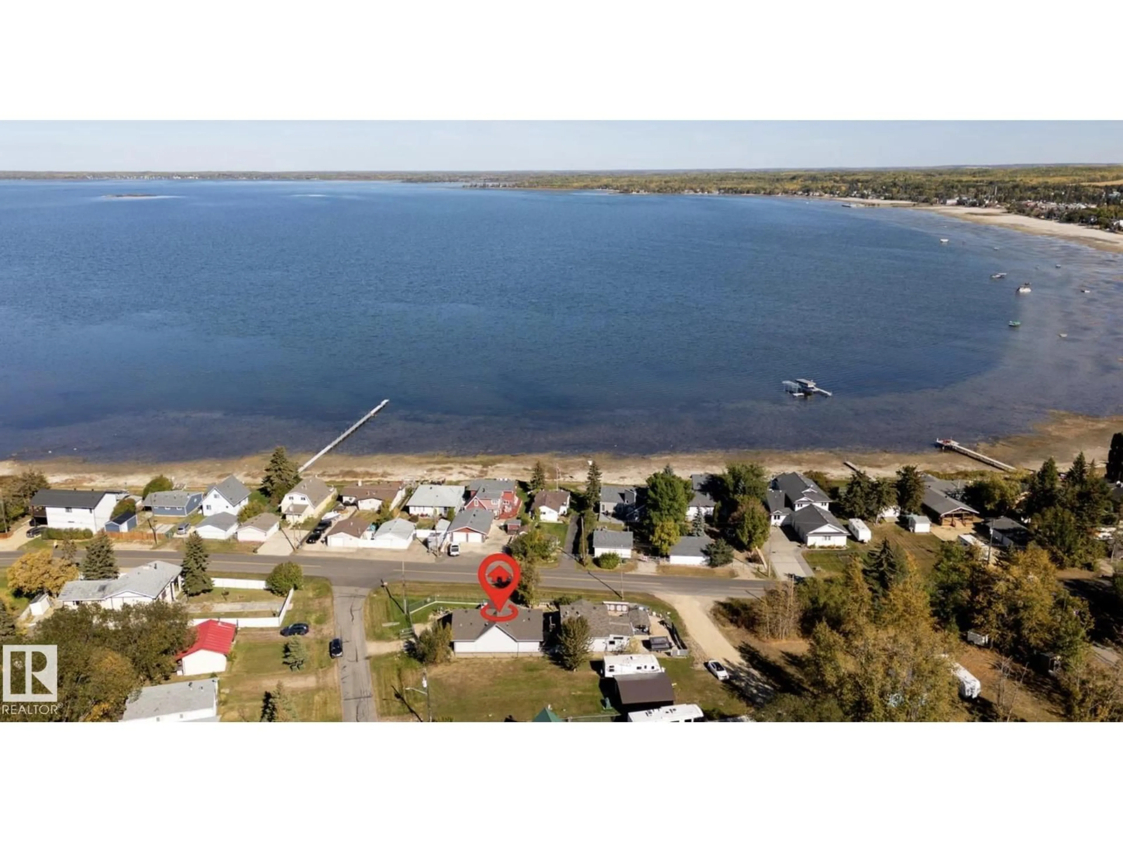 A pic from outside/outdoor area/front of a property/back of a property/a pic from drone, water/lake/river/ocean view for 5001 64 STREET, Rural Lac Ste. Anne County Alberta T0E0A0