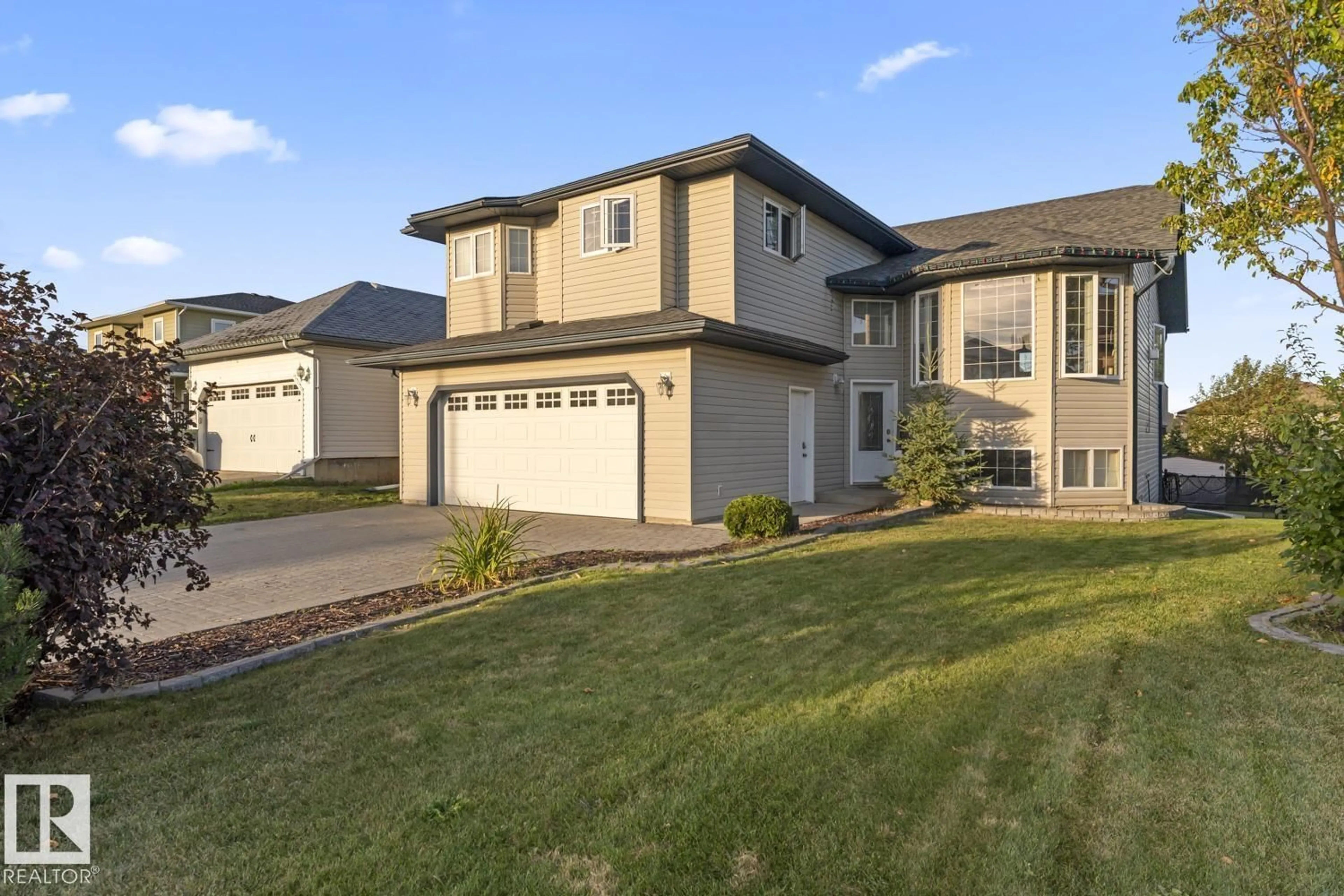 Home with vinyl exterior material, street for 802 26 ST, Cold Lake Alberta T9M1X8