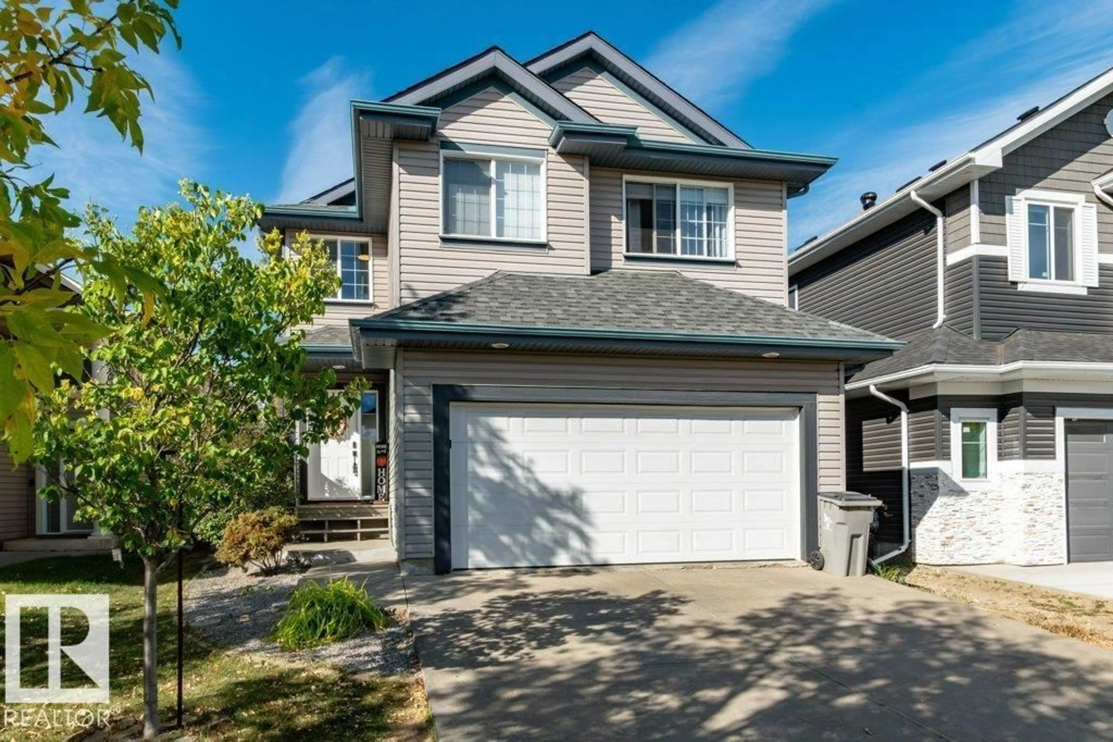 Home with vinyl exterior material, street for 98 RUE MONETTE, Beaumont Alberta T4X1S8