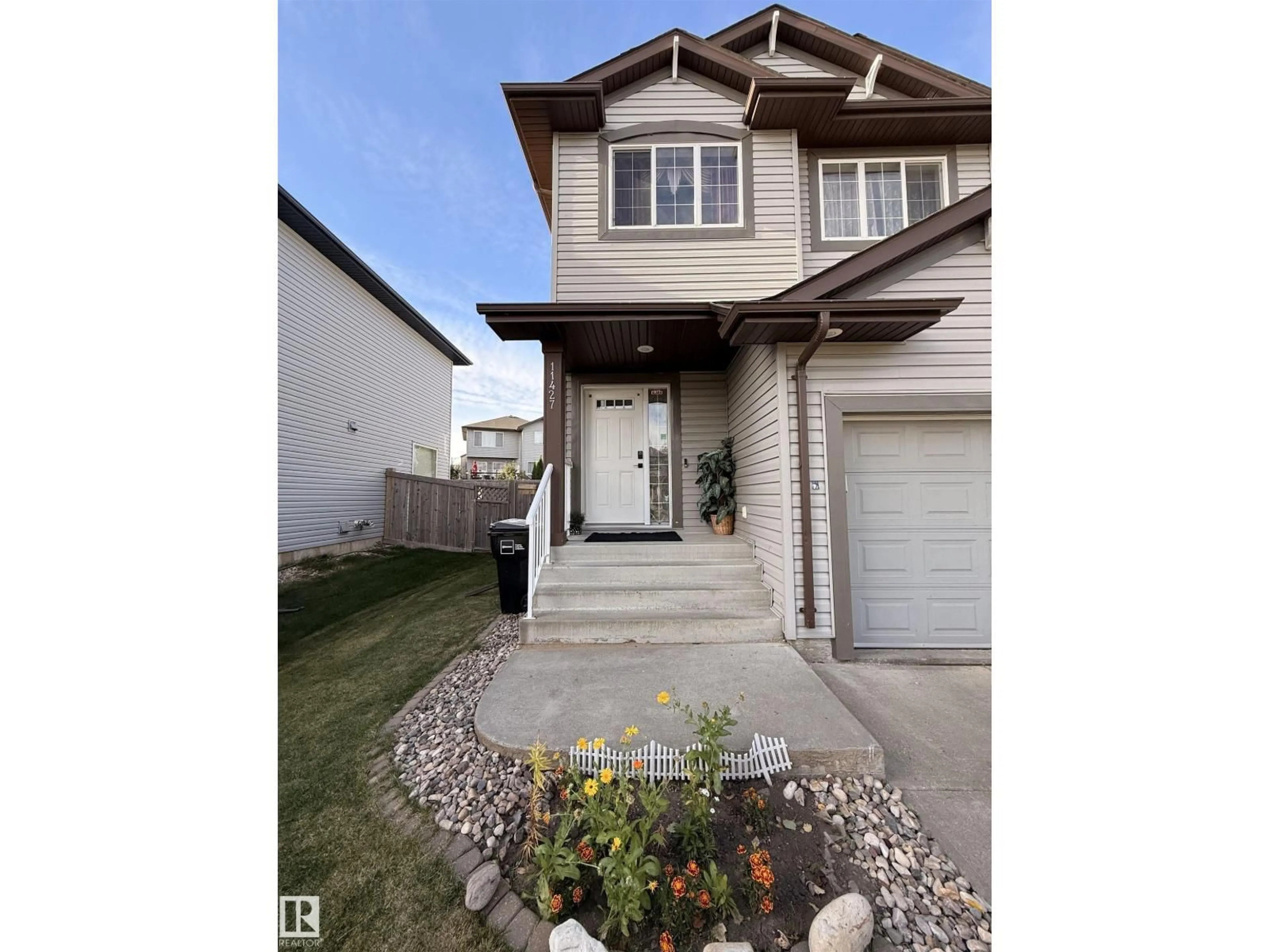 Home with vinyl exterior material, street for SW SW - 11427 13 AV, Edmonton Alberta T6W0G7