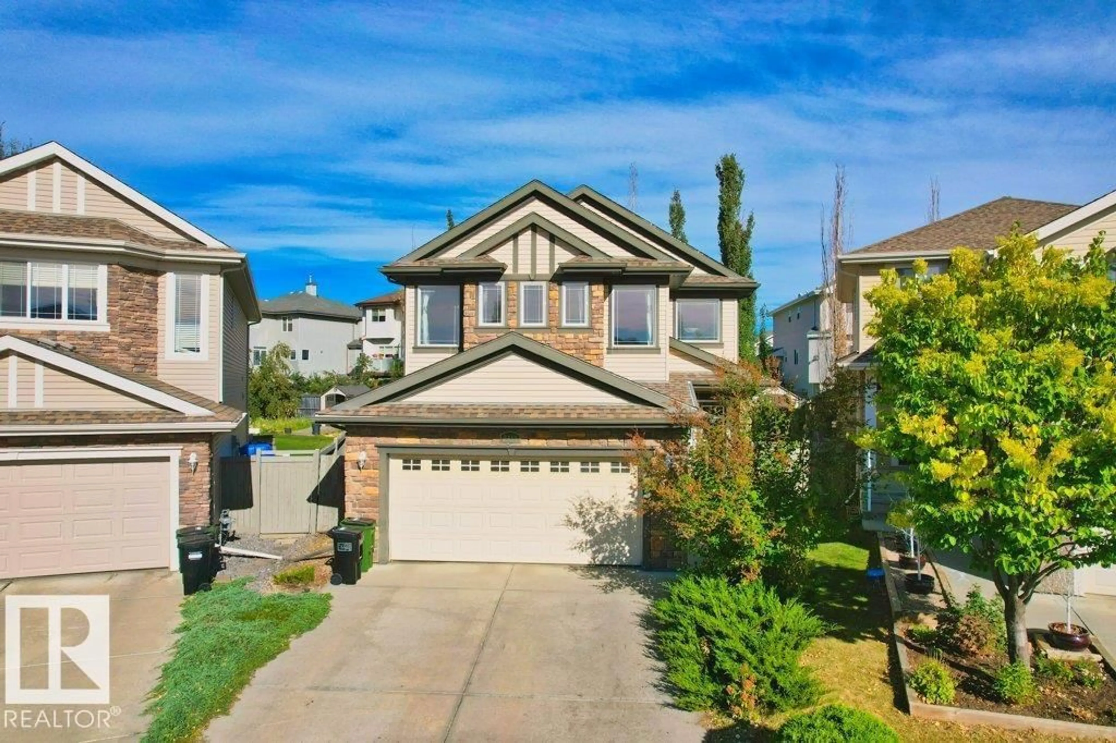 A pic from outside/outdoor area/front of a property/back of a property/a pic from drone, street for 7011 STROM LN, Edmonton Alberta T6R0T1