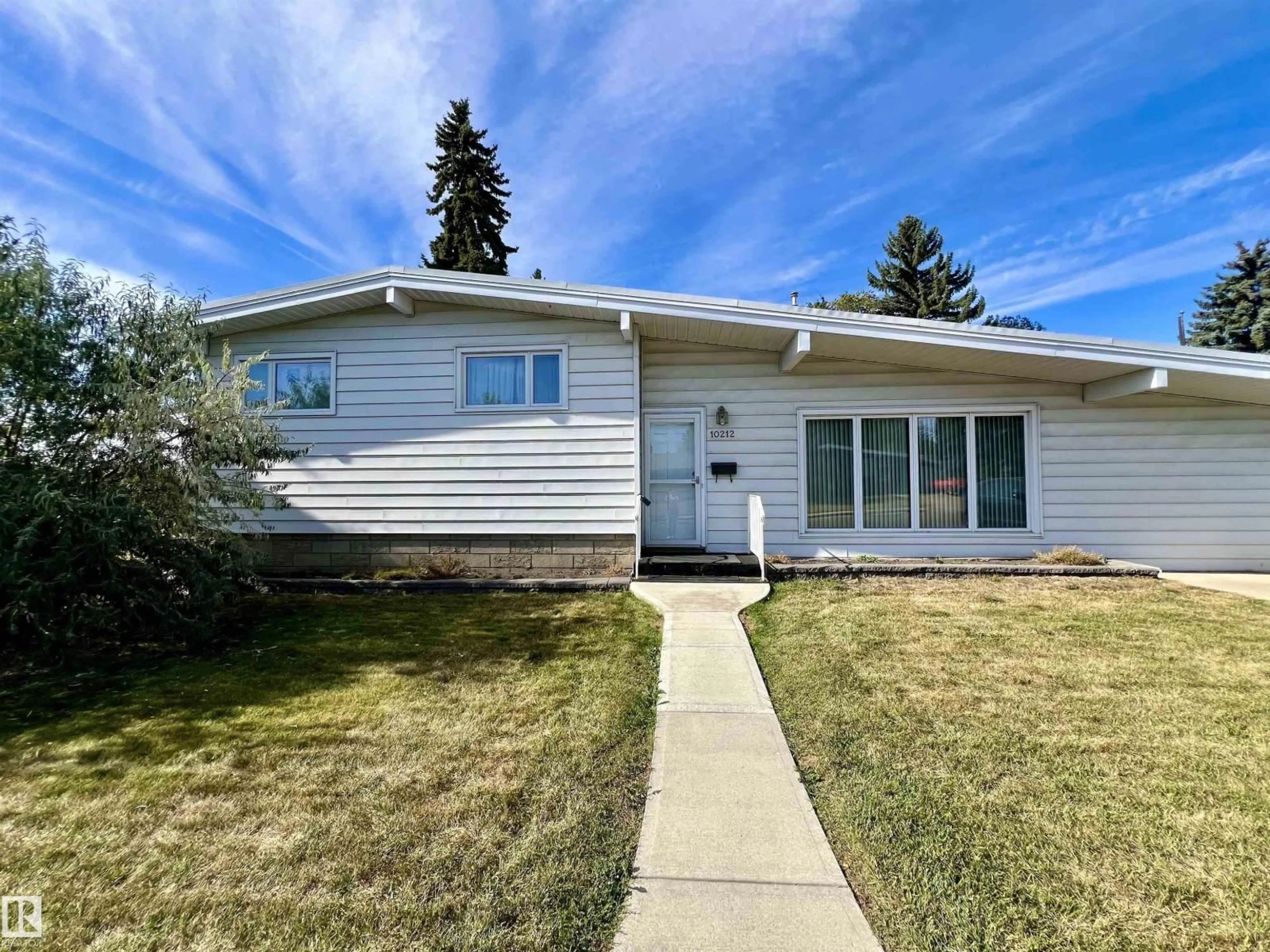 Home with vinyl exterior material, street for 10212 FULTON RD, Edmonton Alberta T6A3T6