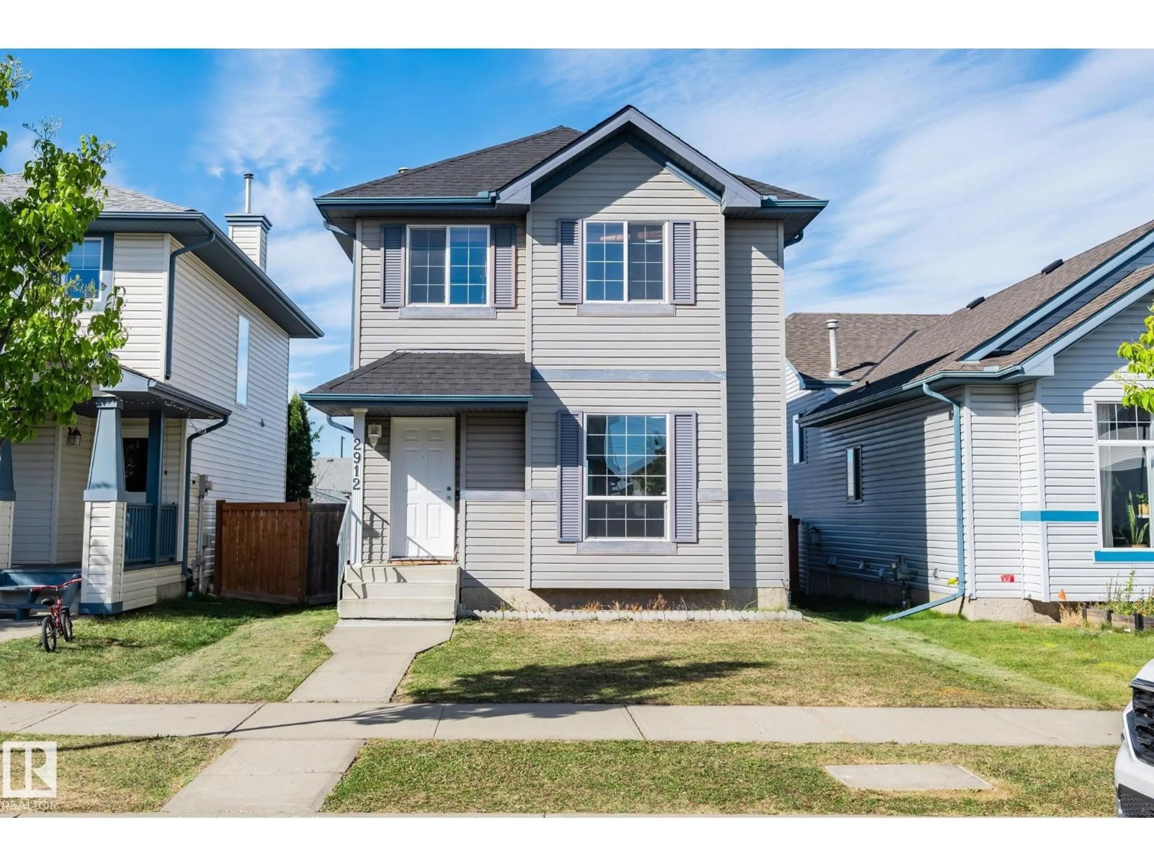 Home with vinyl exterior material, street for NW - 2912 31 STREET, Edmonton Alberta T6T1T9