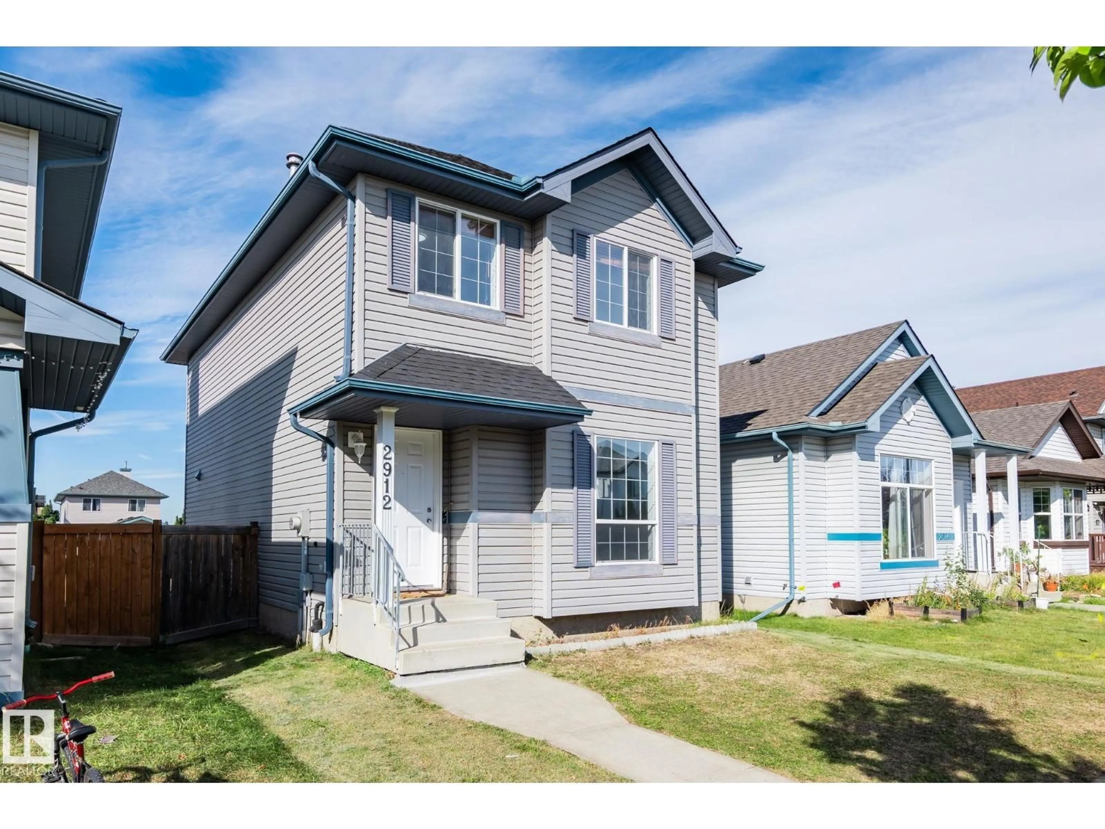 Home with vinyl exterior material, street for NW - 2912 31 STREET, Edmonton Alberta T6T1T9