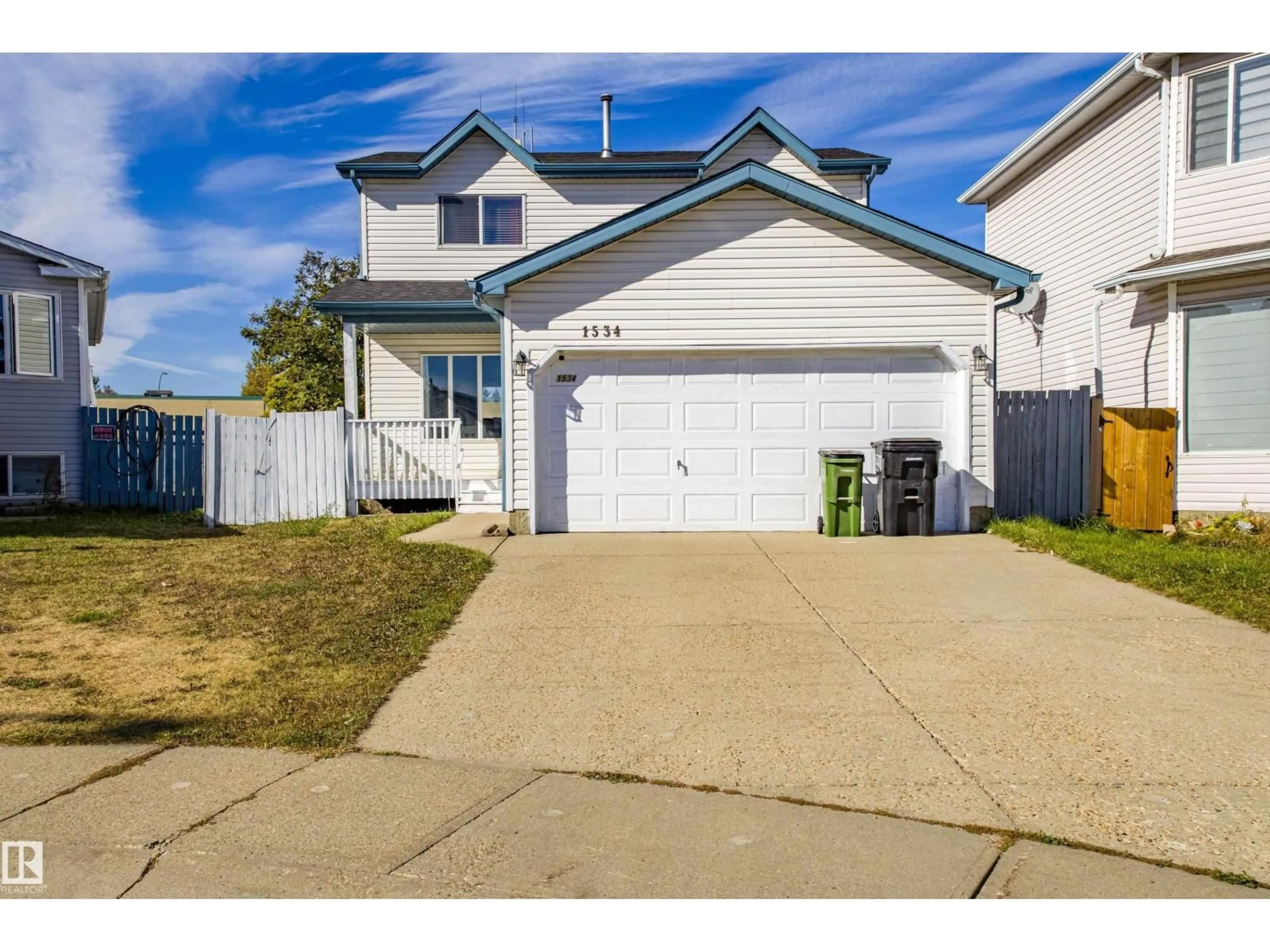 Home with vinyl exterior material, street for 1534 49A ST NW, Edmonton Alberta T6L6Y5