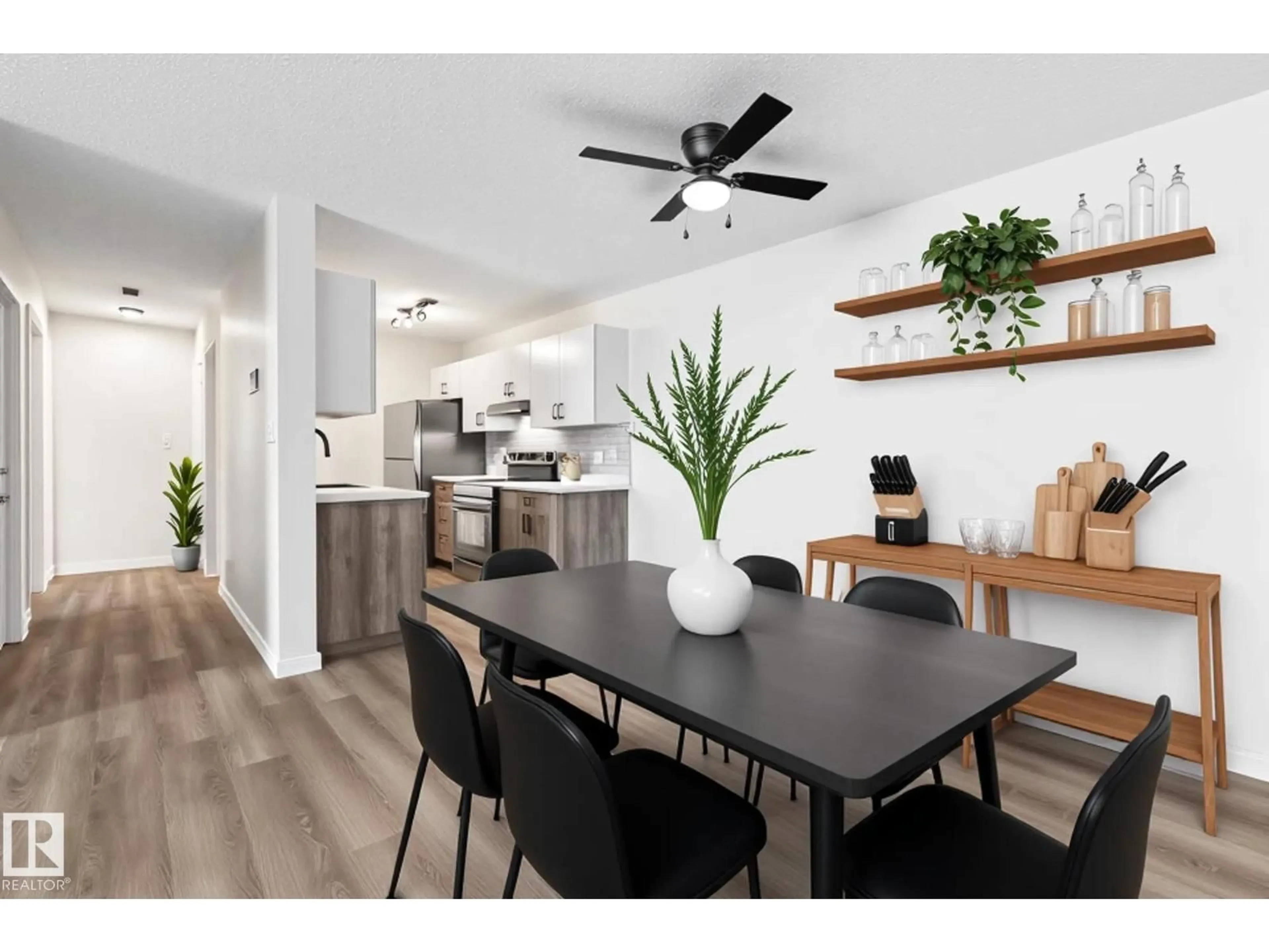 Open concept kitchen, wood/laminate floor for 308 - 6208 180 ST, Edmonton Alberta T5T2T2