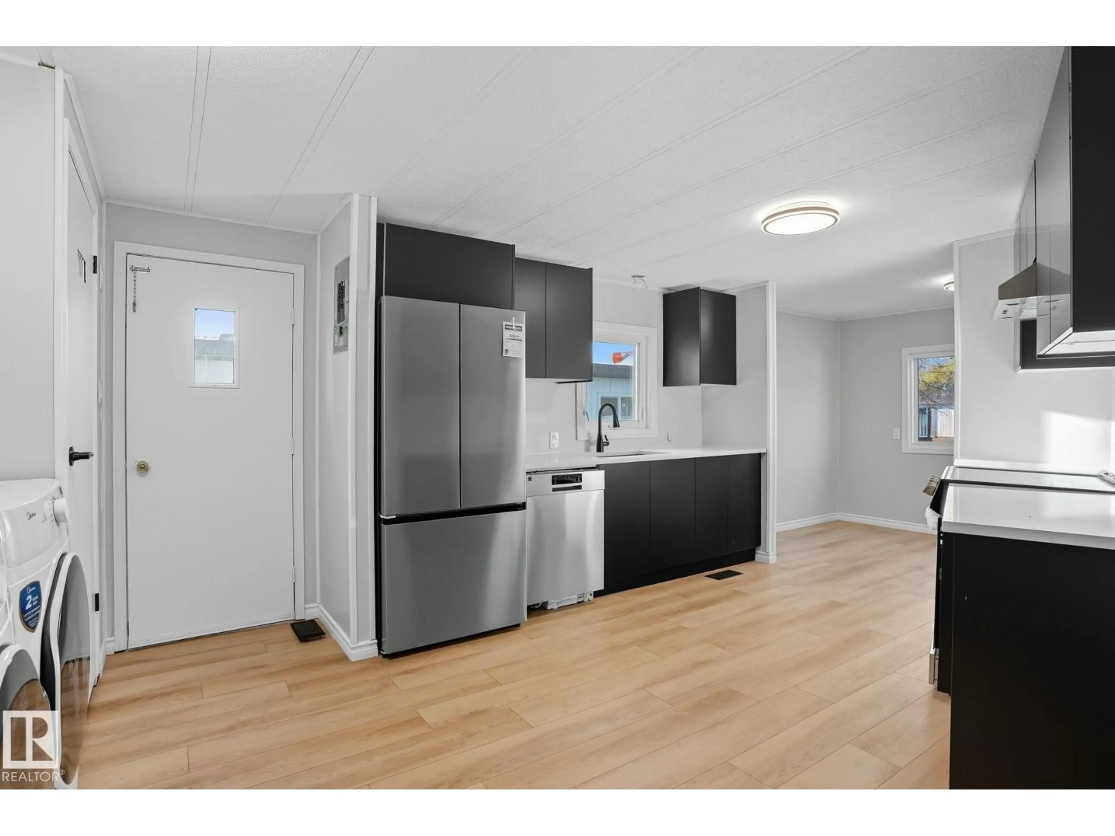 Open concept kitchen, wood/laminate floor for 67 RIDGEWAY DR, Edmonton Alberta T6P1C2
