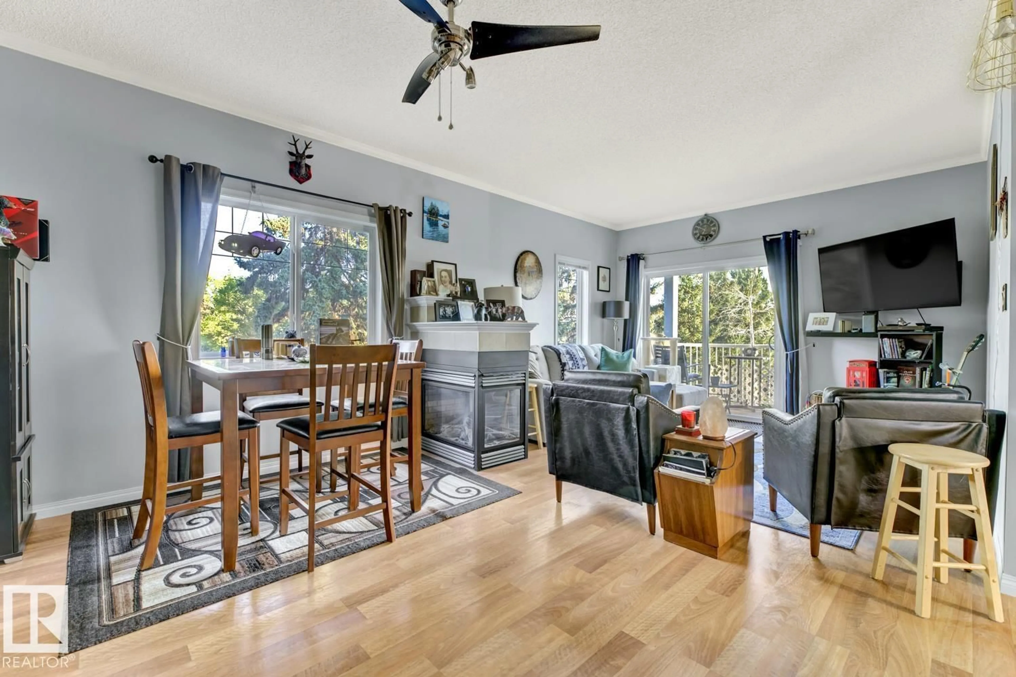 Living room with furniture, wood/laminate floor for 33C - 79 BELLEROSE DR, St. Albert Alberta T8N1C5