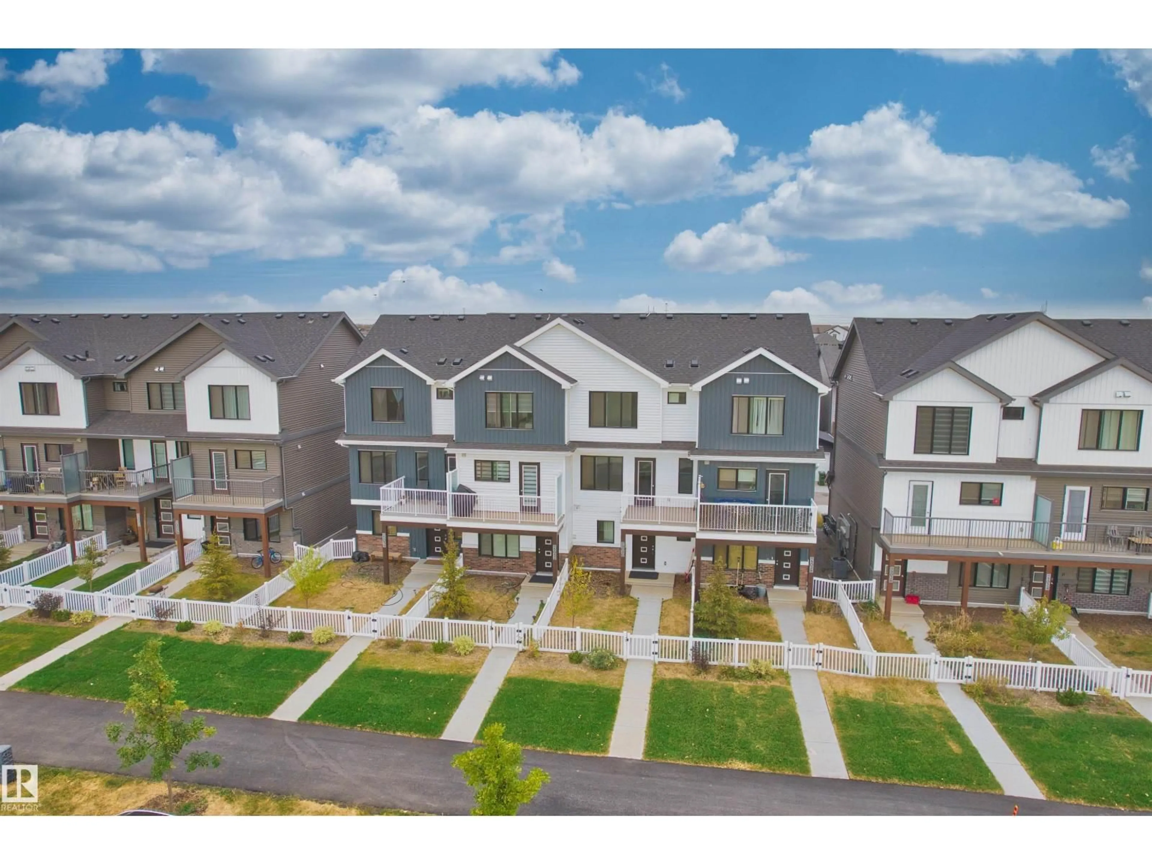 A pic from outside/outdoor area/front of a property/back of a property/a pic from drone, mountain view for 5030 RIVER'S EDGE WY, Edmonton Alberta T6M1P9