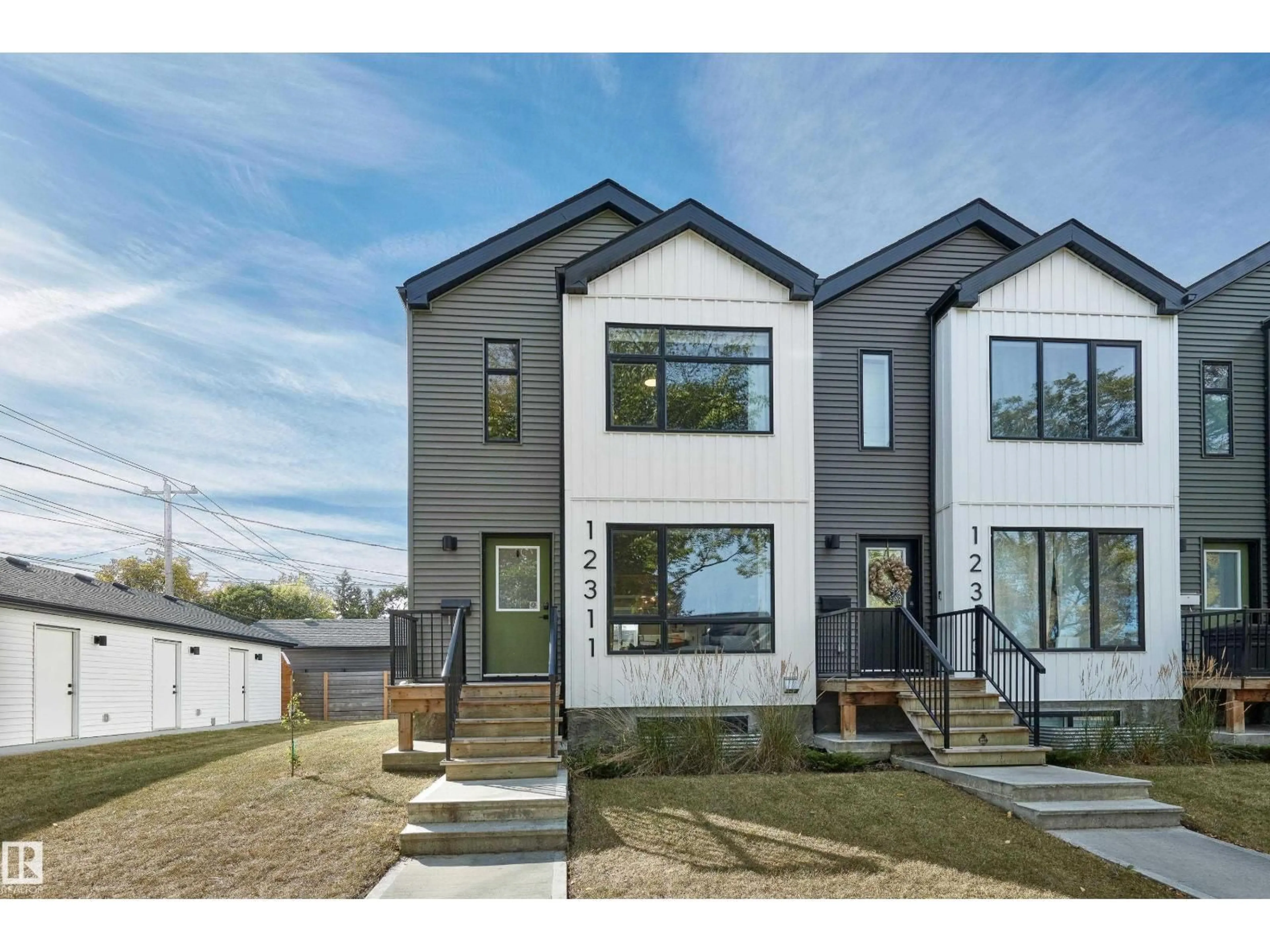 Home with brick exterior material, street for 12311 121 AV, Edmonton Alberta T5L3A3