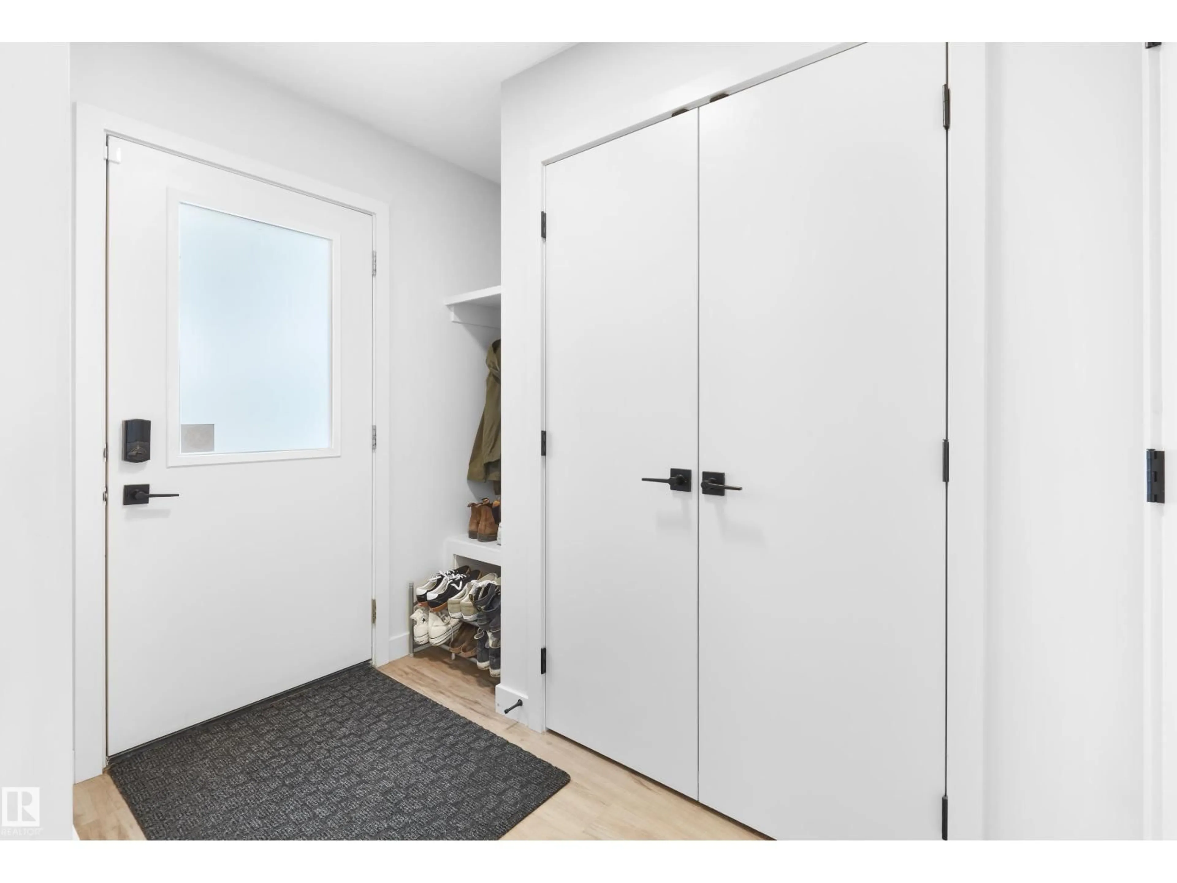 Indoor entryway for 12311 121 AV, Edmonton Alberta T5L3A3