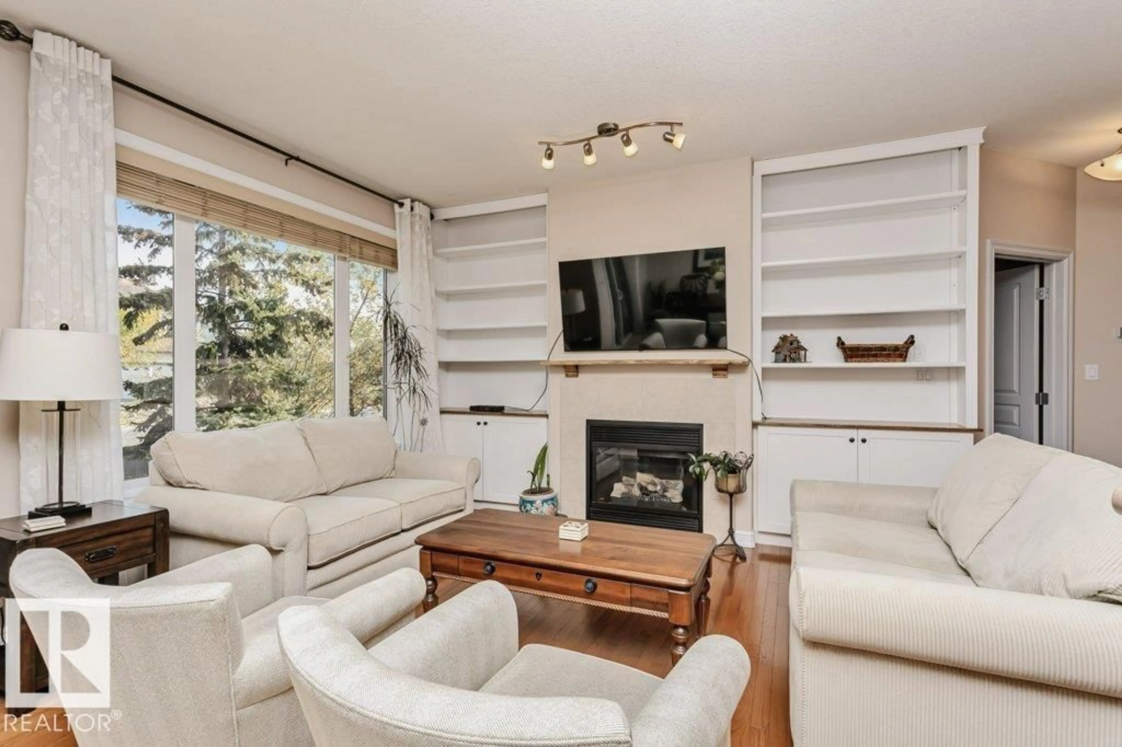 Living room with furniture, wood/laminate floor for #23 - 16224 73 ST, Edmonton Alberta T5Z4A1