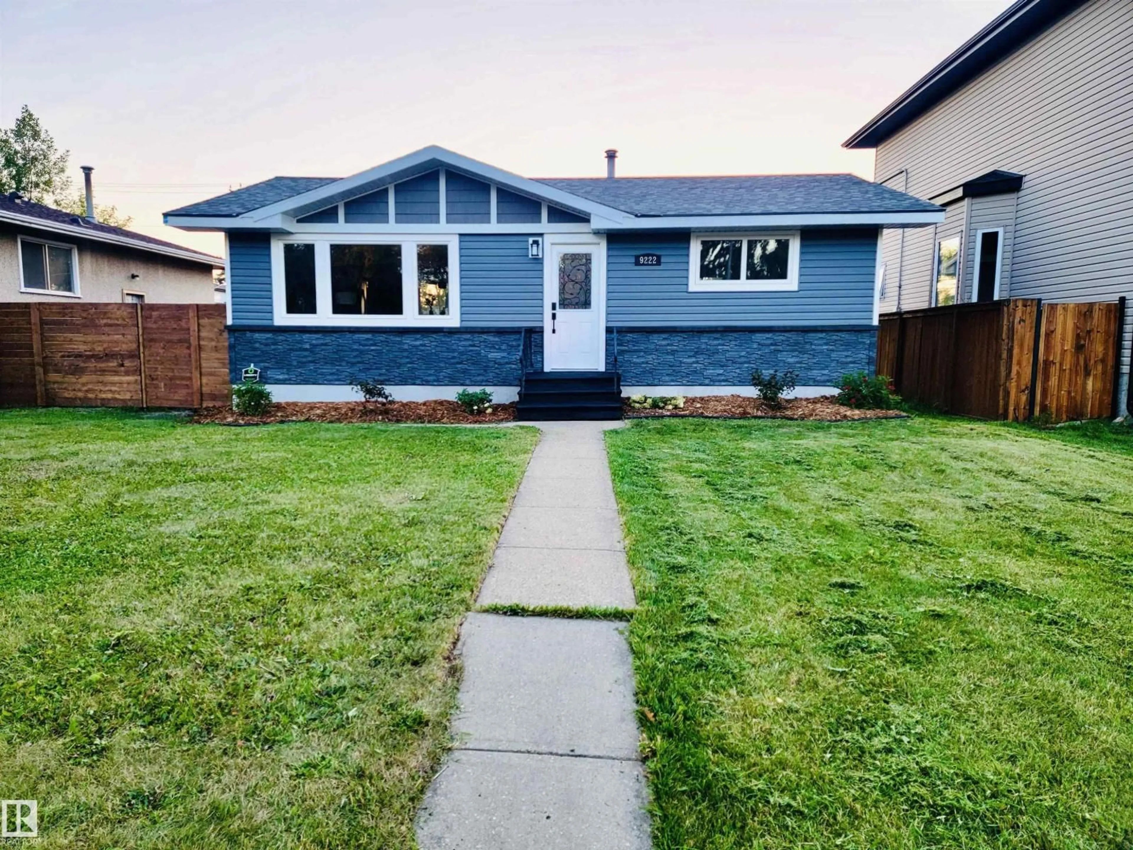 Home with vinyl exterior material, street for NW - 9222 151 ST, Edmonton Alberta T5R1J7