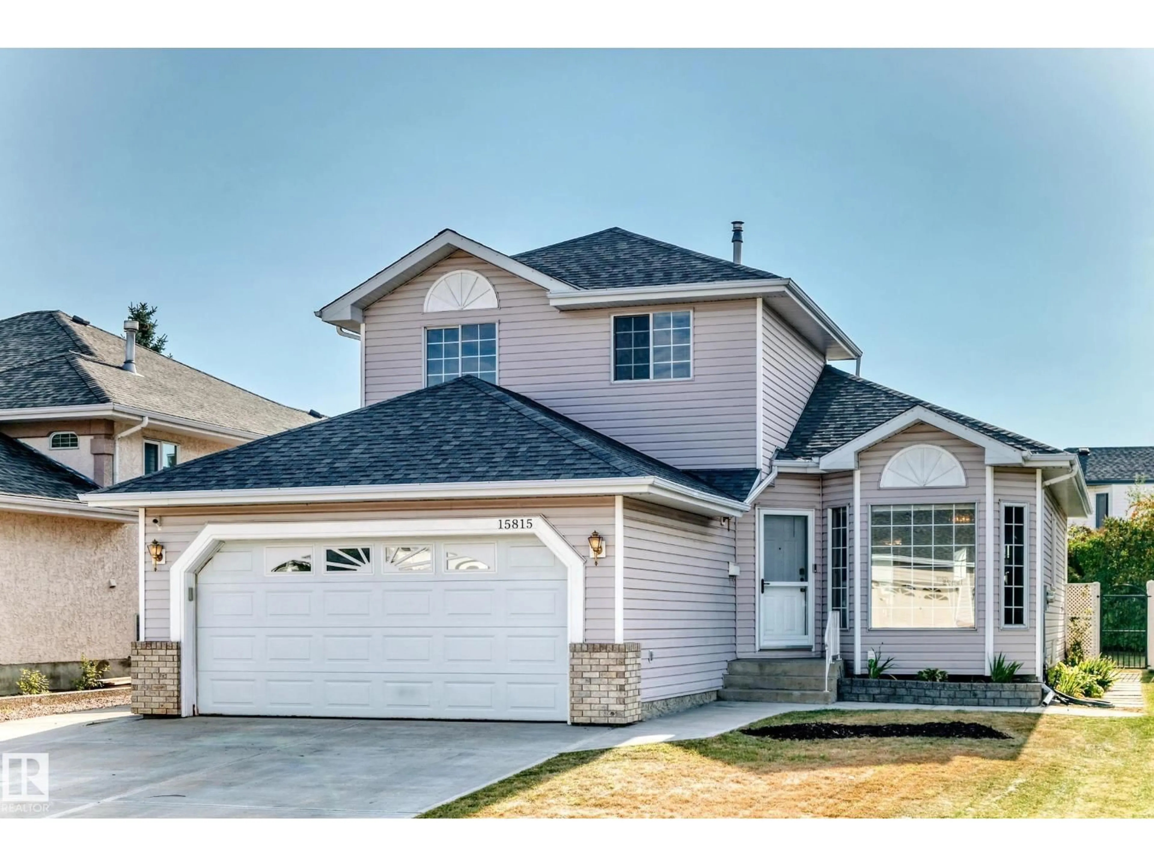 Home with vinyl exterior material, street for NW - 15815 63 ST, Edmonton Alberta T5Y2R8