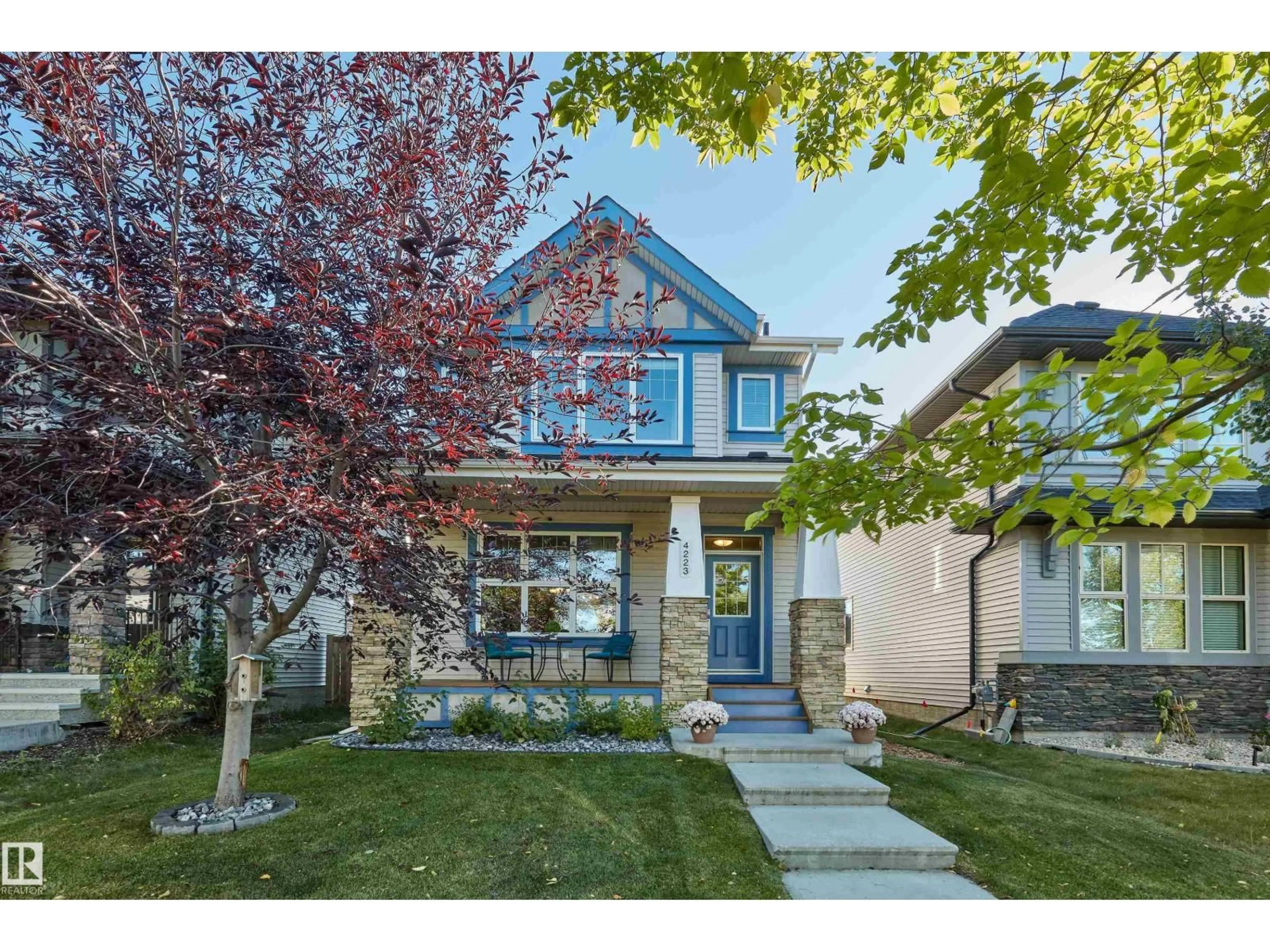 Home with vinyl exterior material, street for 4223 ALLAN LI SW, Edmonton Alberta T6W2K1
