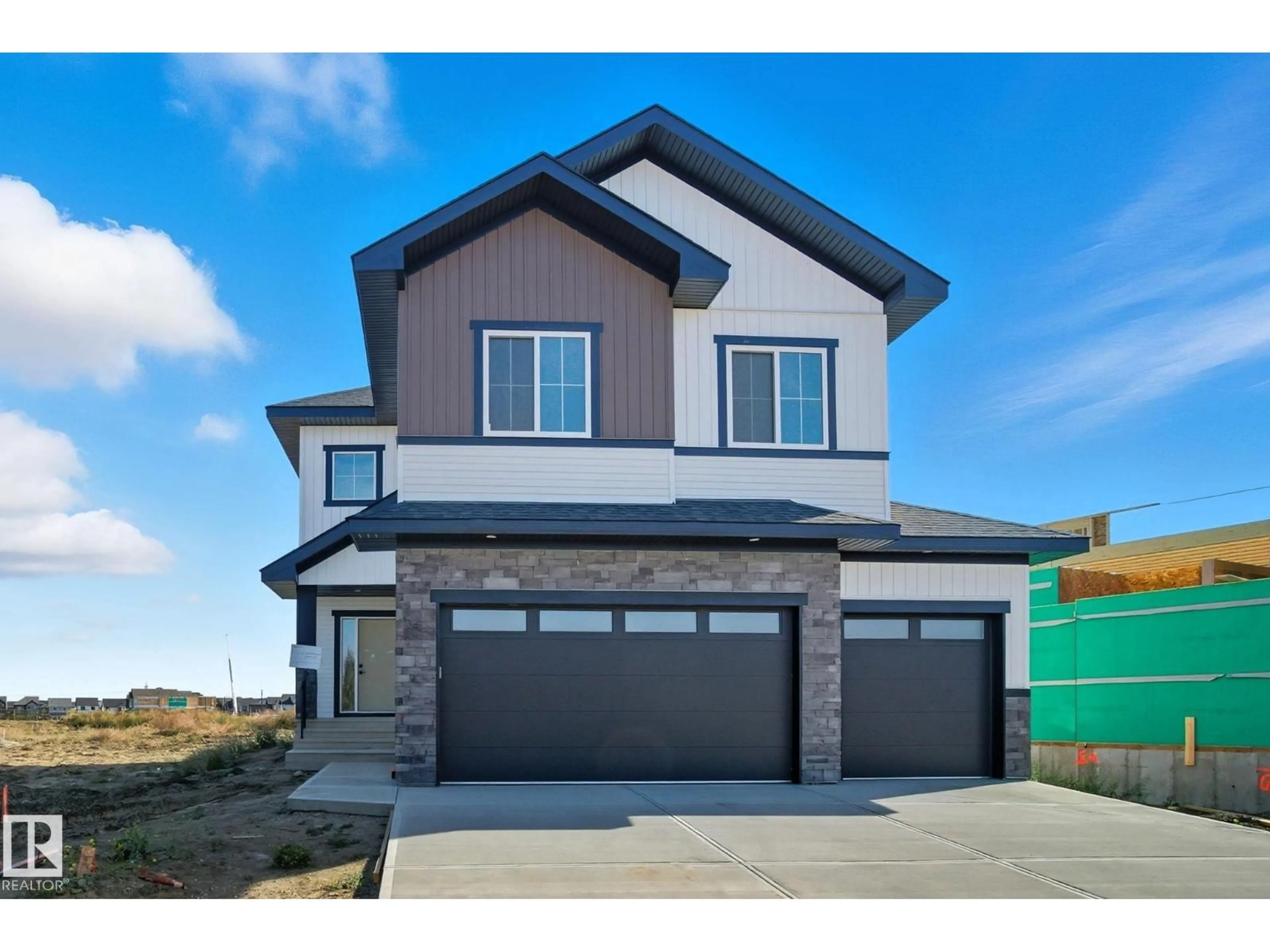 Home with vinyl exterior material, street for 3325 CHERNOWSKI WY, Edmonton Alberta T6W5H2