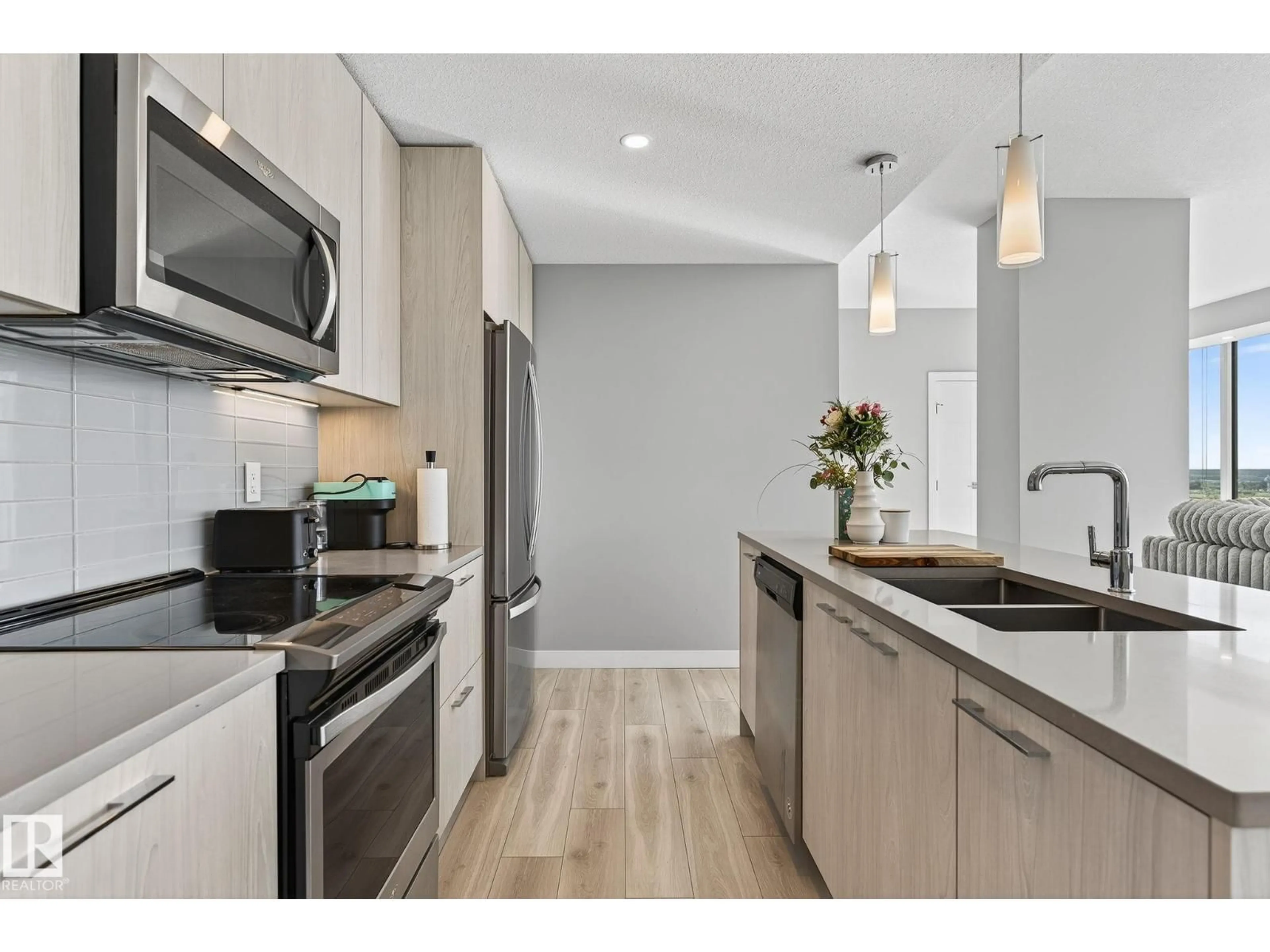 Open concept kitchen, unknown for 3100 10180 103 ST NW, Edmonton Alberta T5J0L1