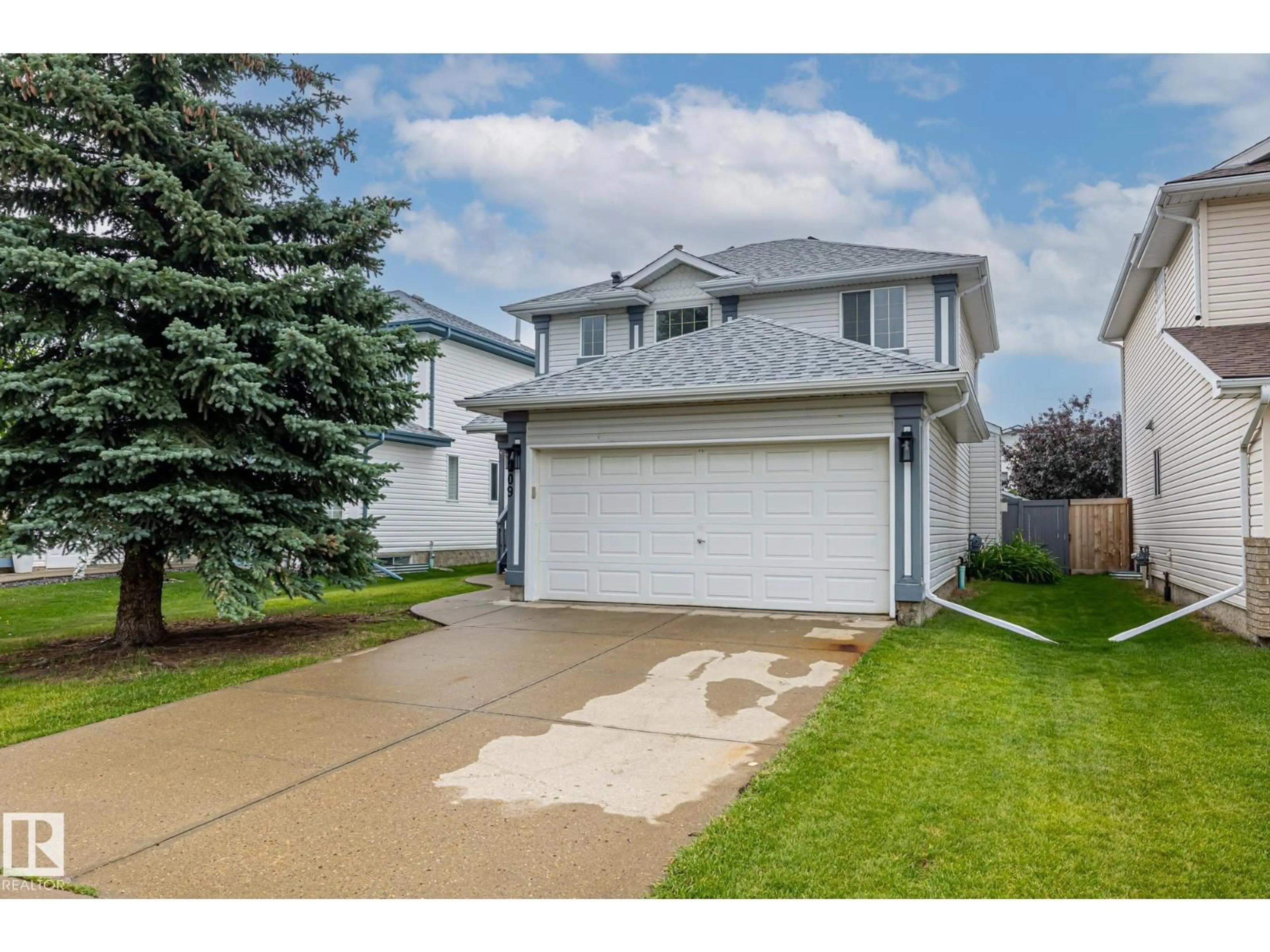 Home with vinyl exterior material, street for 209 BANCROFT CL, Edmonton Alberta T5T6B5
