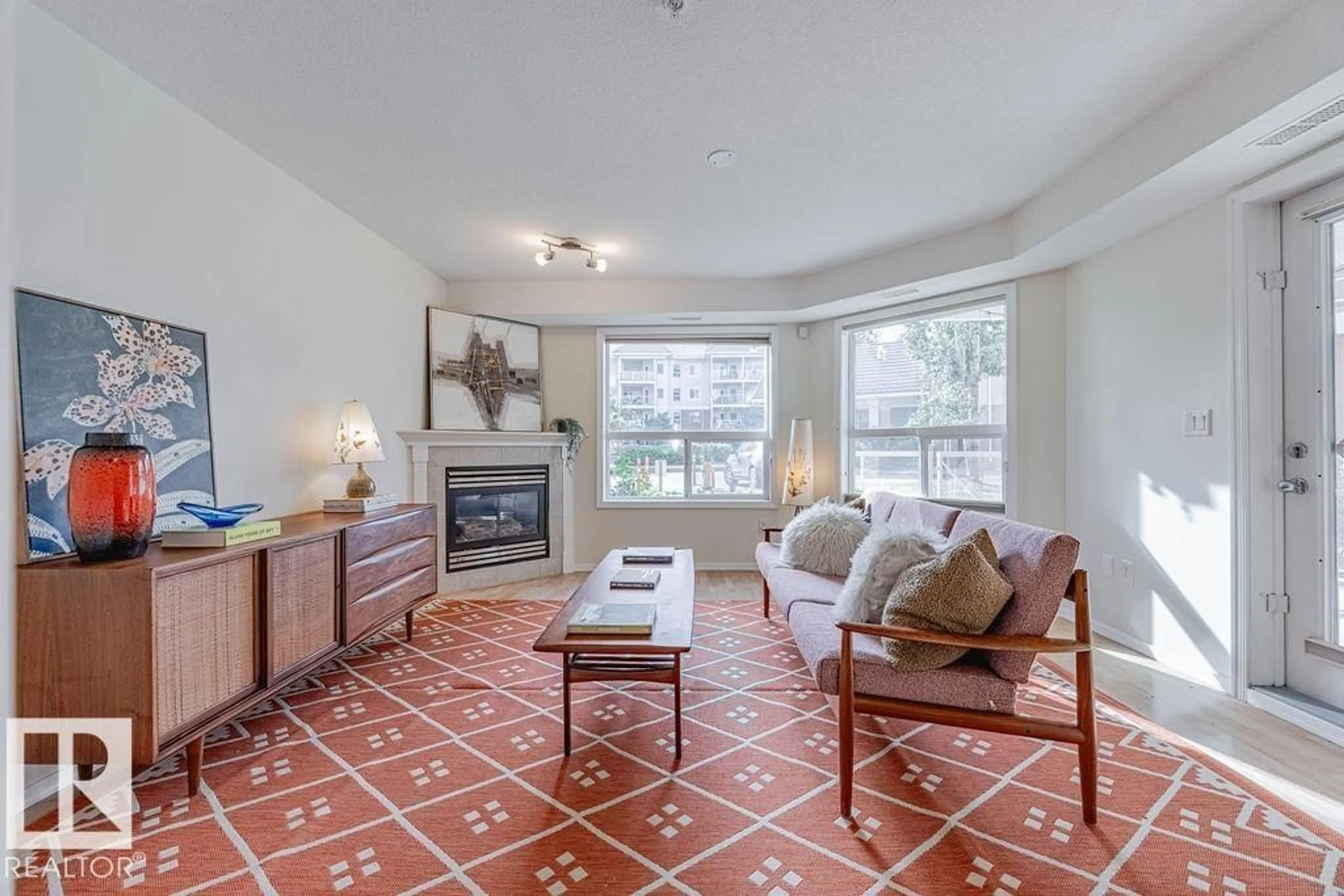 Living room with furniture, ceramic/tile floor for #102 - 9008 99 AV, Edmonton Alberta T5H4M6