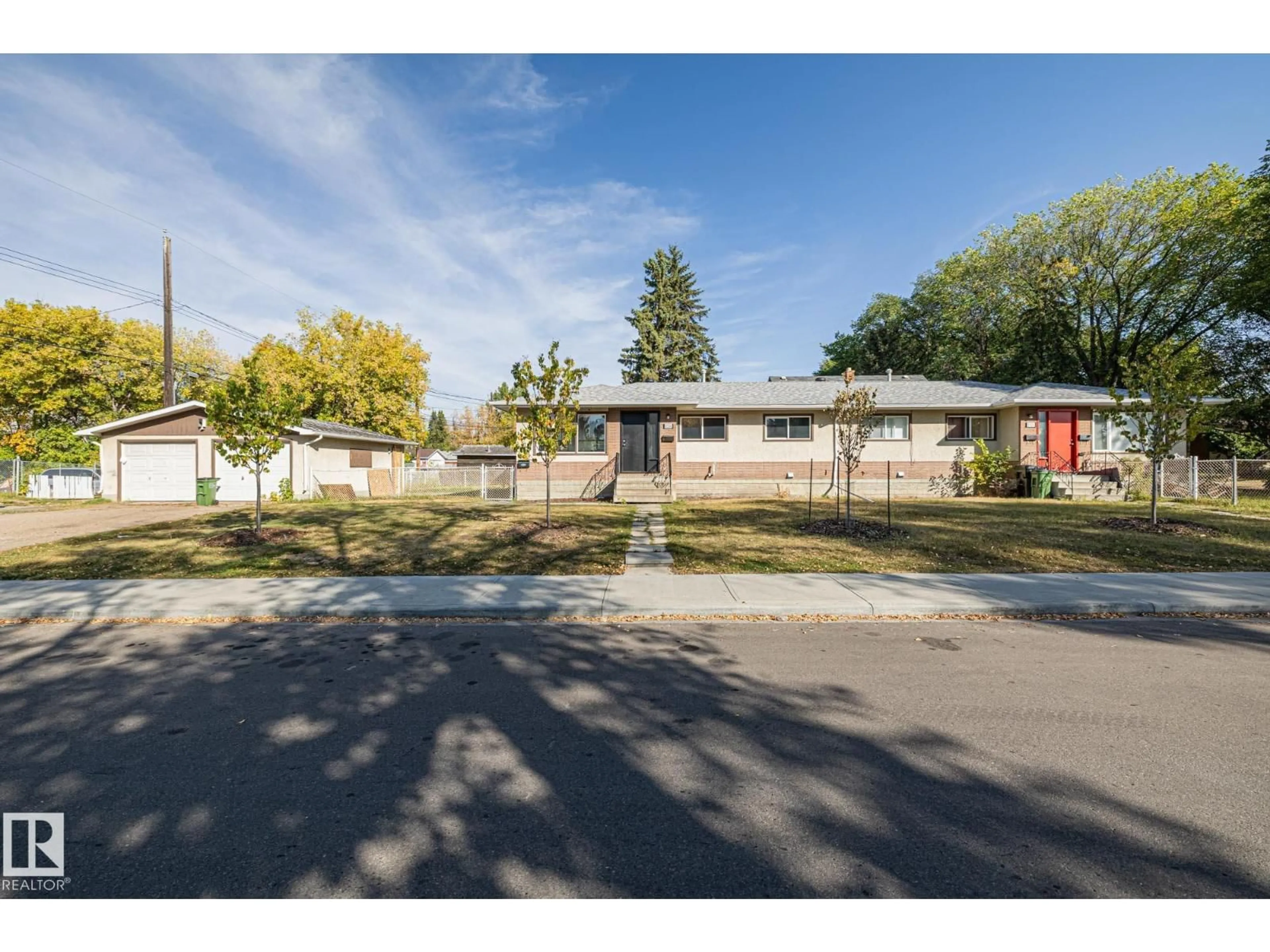 A pic from outside/outdoor area/front of a property/back of a property/a pic from drone, street for 8504 121 AV, Edmonton Alberta T5B0Z2