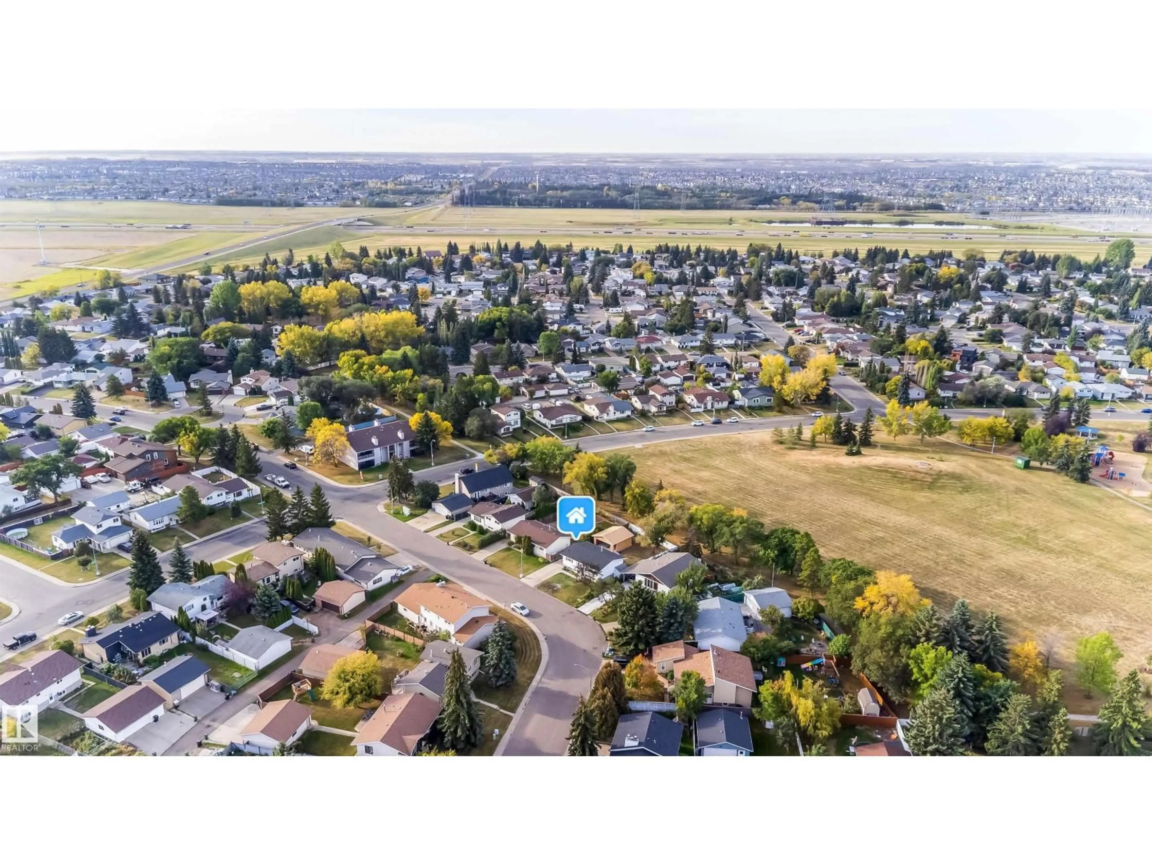 A pic from outside/outdoor area/front of a property/back of a property/a pic from drone, mountain view for 7115 12 AV, Edmonton Alberta T6K3H6