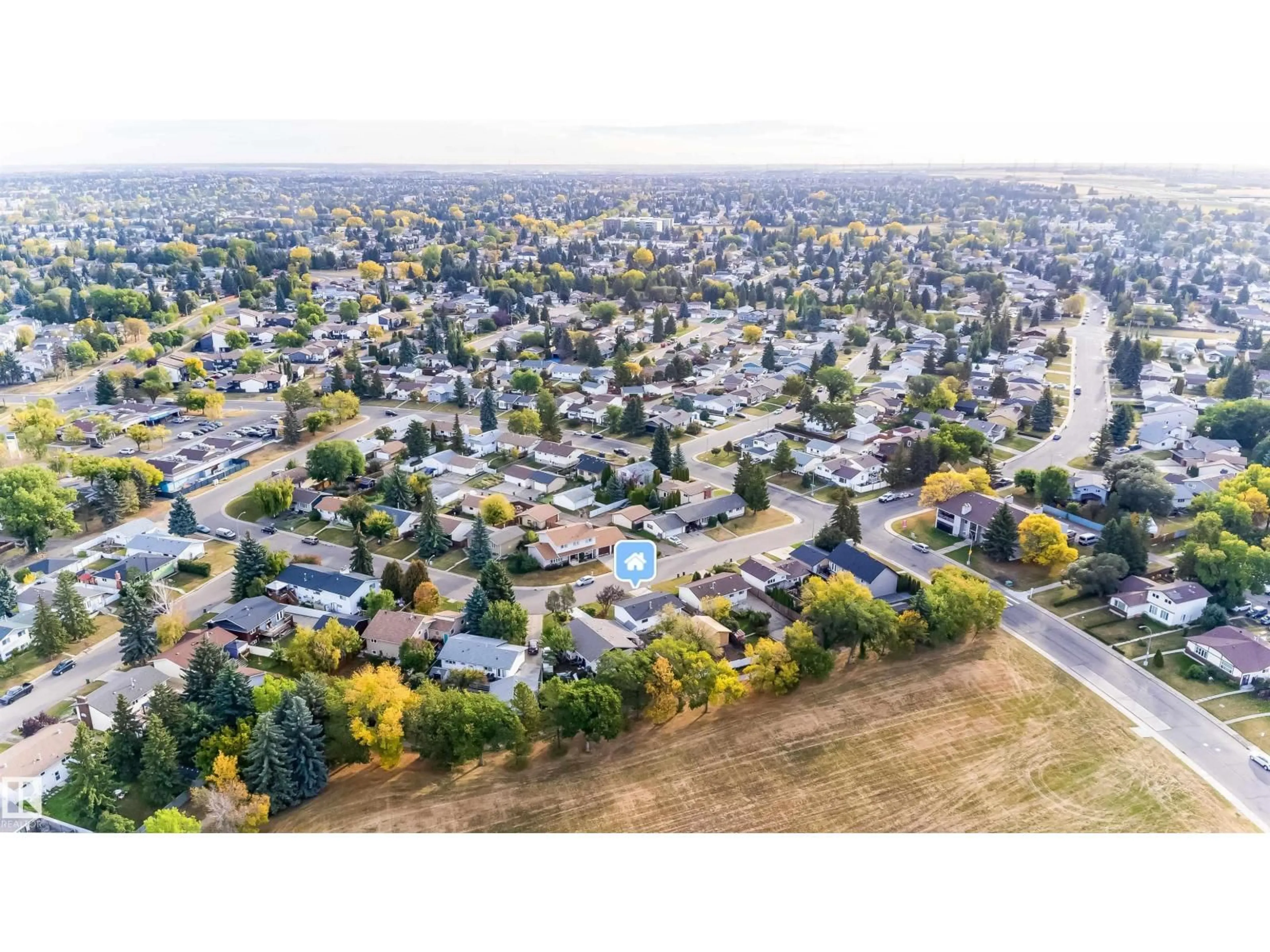 A pic from outside/outdoor area/front of a property/back of a property/a pic from drone, street for 7115 12 AV, Edmonton Alberta T6K3H6