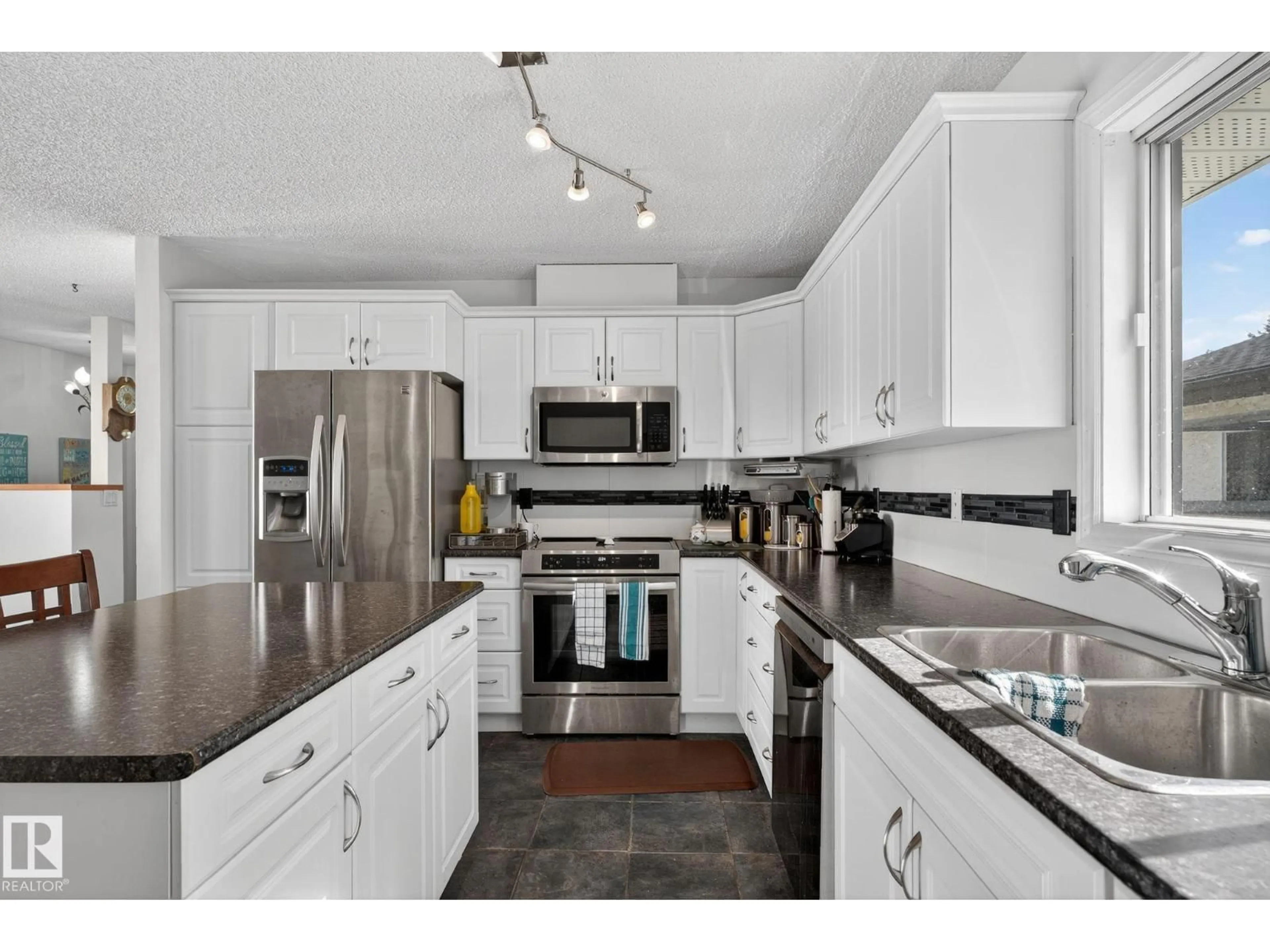 Open concept kitchen, unknown for 5604 186 ST, Edmonton Alberta T6M1Z9
