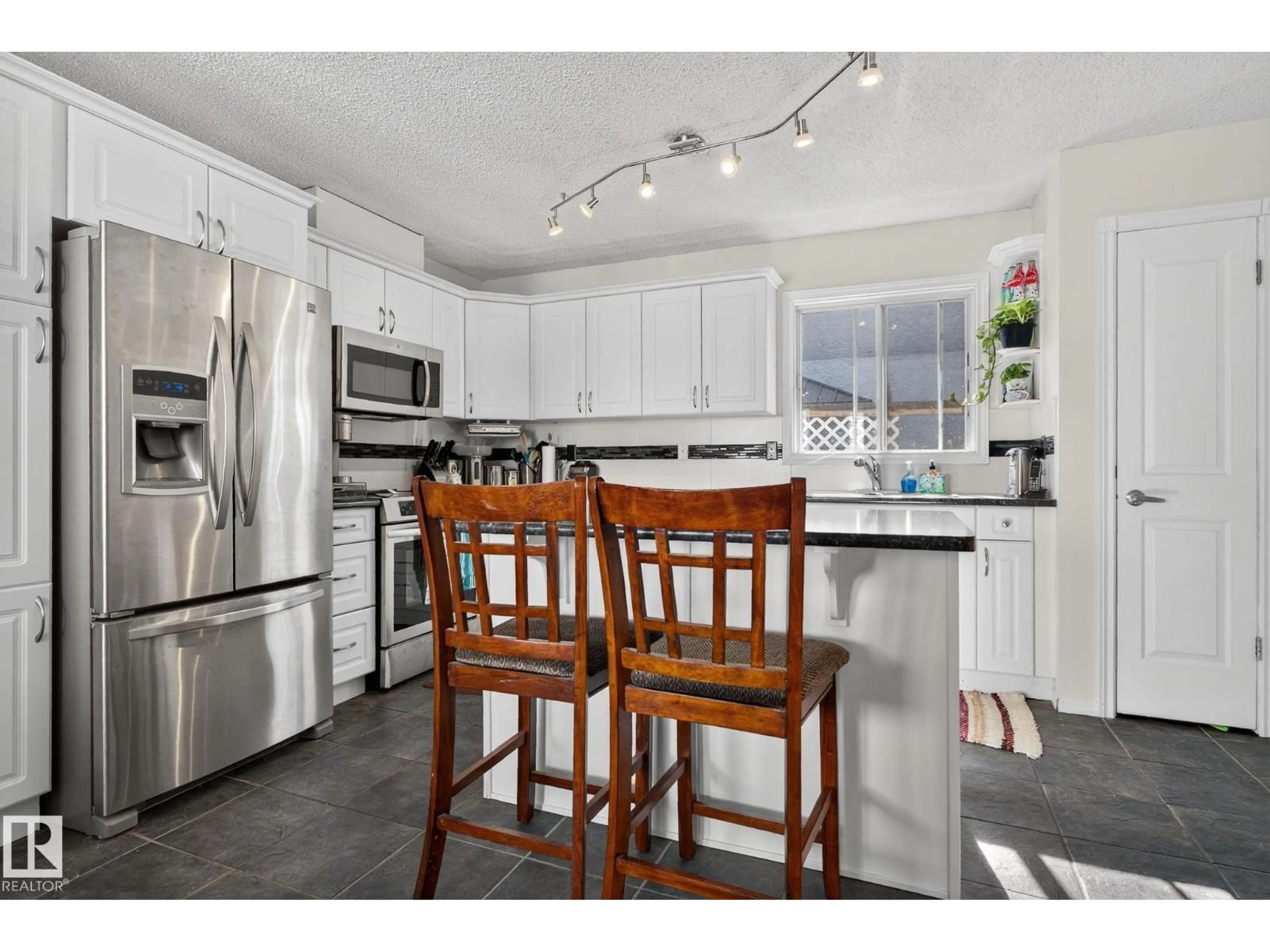 Open concept kitchen, unknown for 5604 186 ST, Edmonton Alberta T6M1Z9