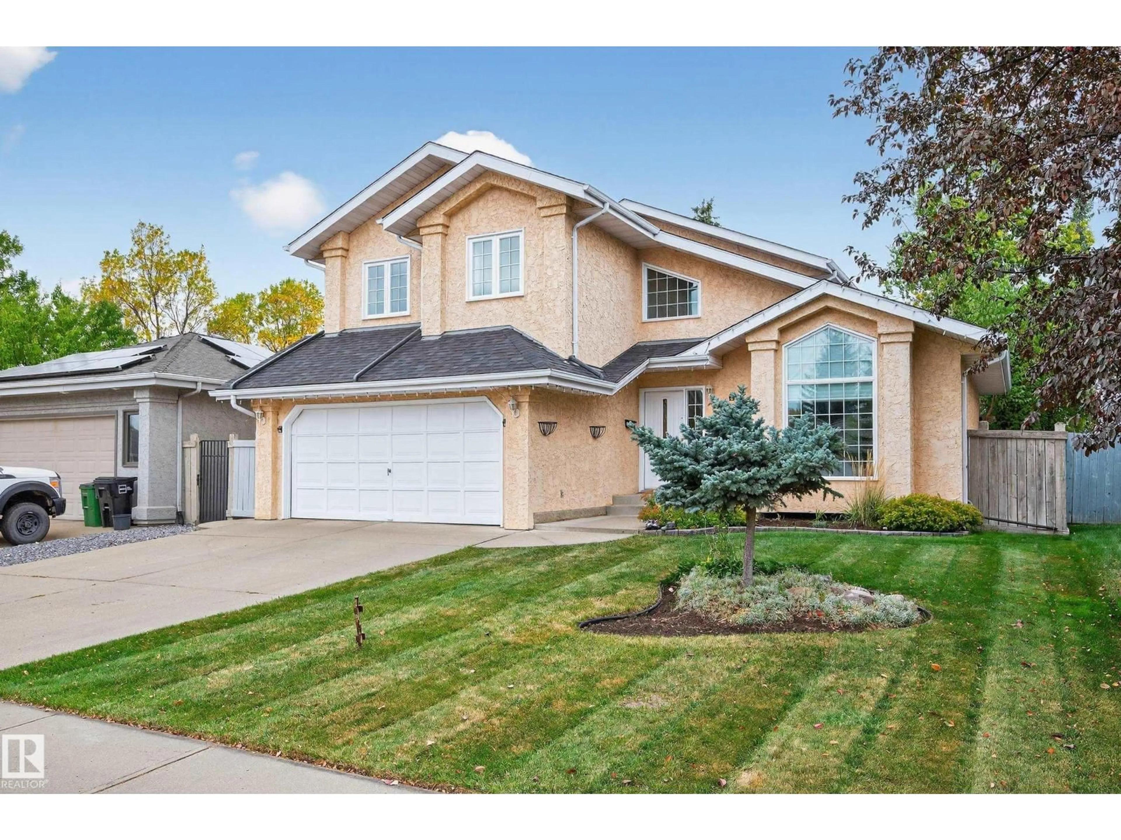 Home with vinyl exterior material, street for 11254 10A AV, Edmonton Alberta T6J6S3
