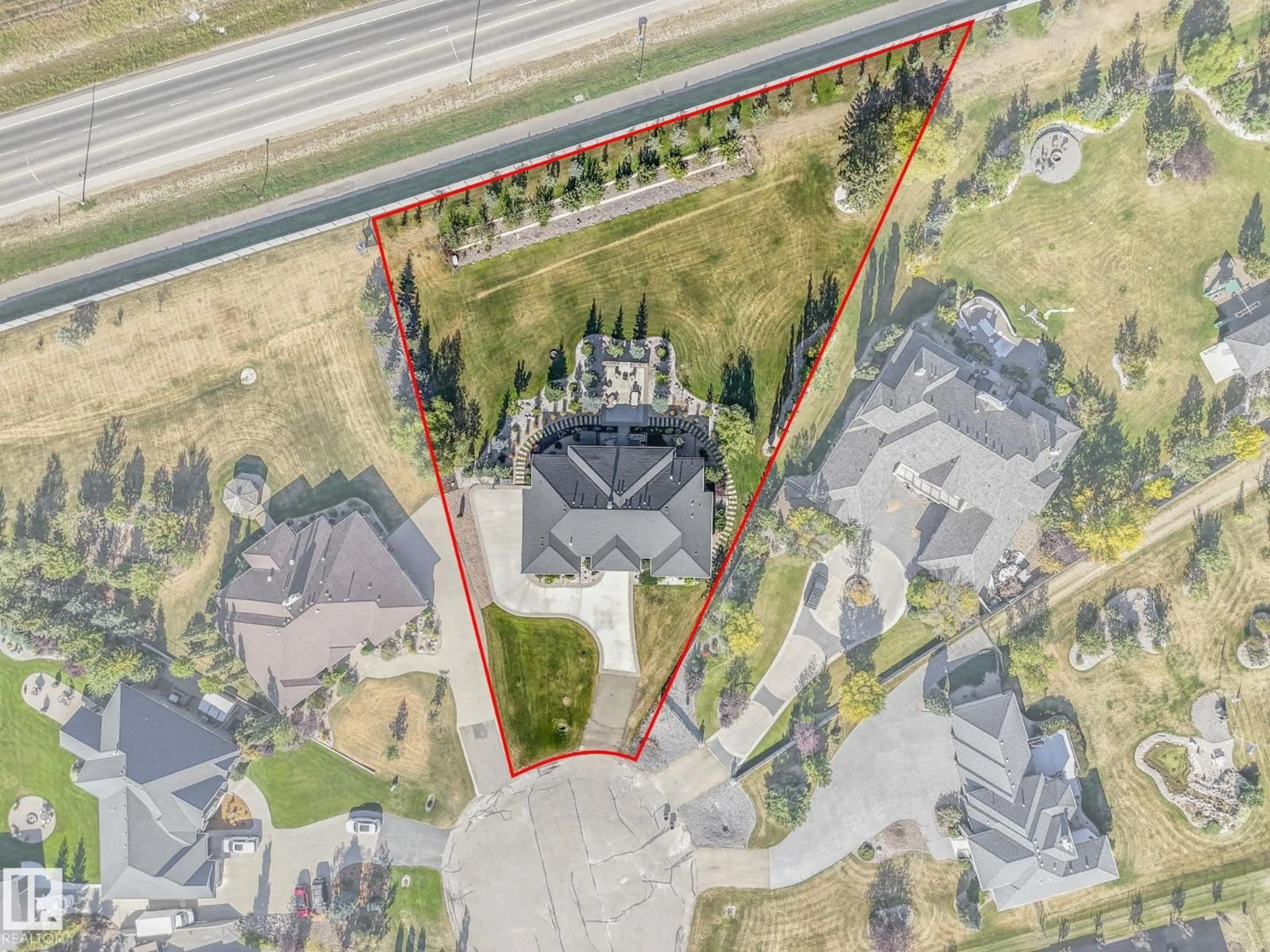 A pic from outside/outdoor area/front of a property/back of a property/a pic from drone, street for 1110 RGE ROAD 245, Rural Leduc County Alberta T4X0P5