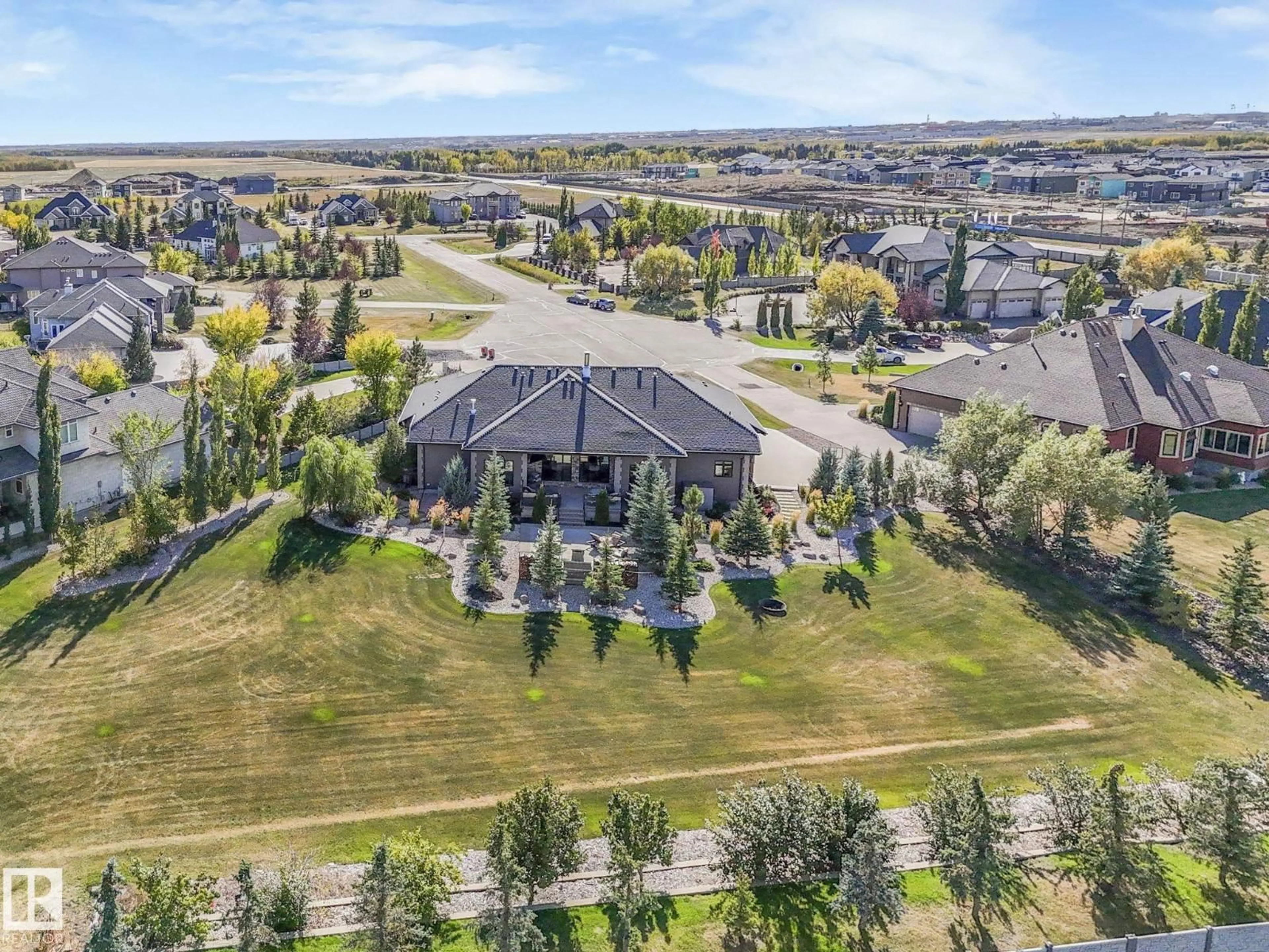 A pic from outside/outdoor area/front of a property/back of a property/a pic from drone, mountain view for 1110 RGE ROAD 245, Rural Leduc County Alberta T4X0P5
