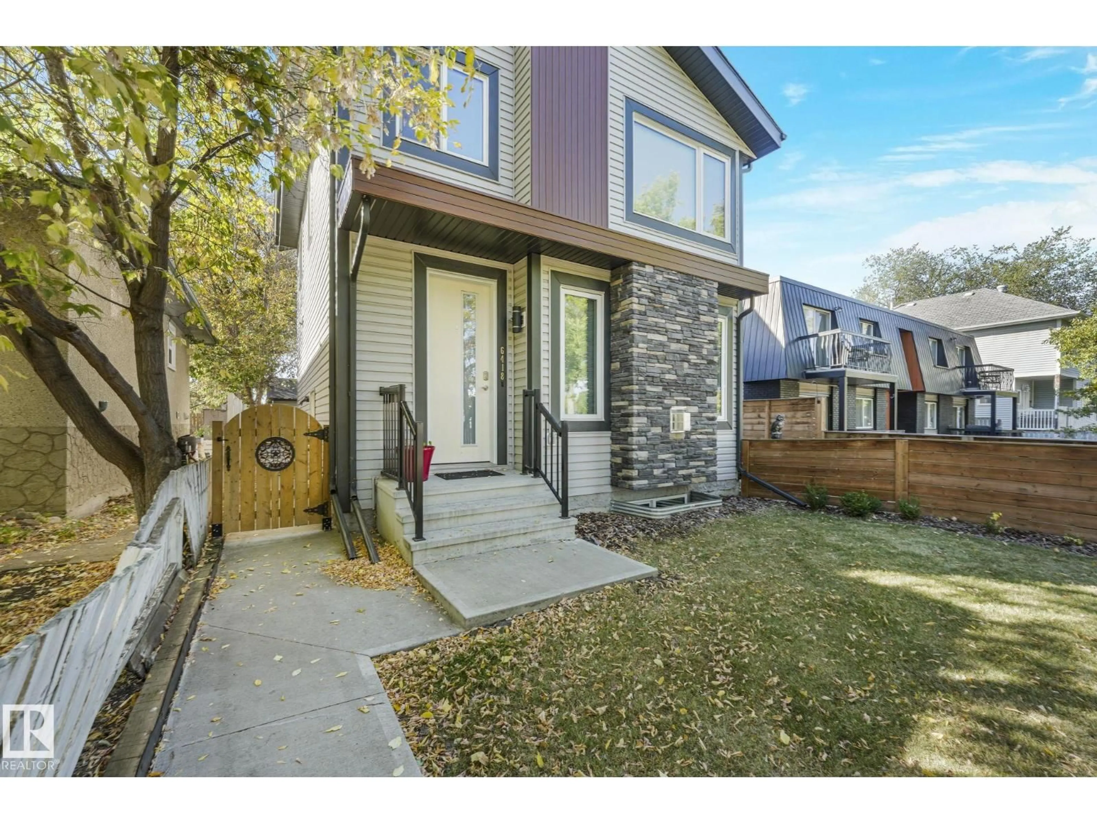Home with brick exterior material, street for NW - 6418 106 ST, Edmonton Alberta T6H2V4