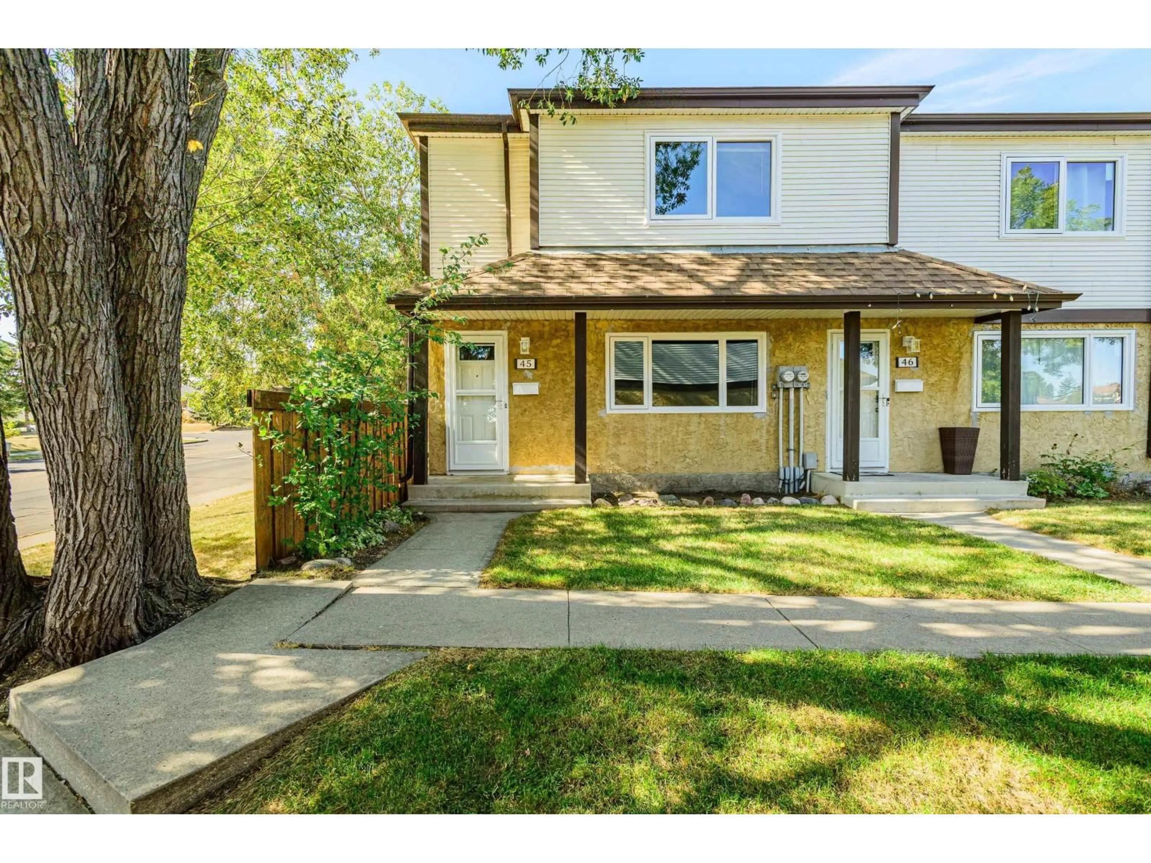 Home with vinyl exterior material, street for #45 - 14511 52 ST, Edmonton Alberta T5A4M6