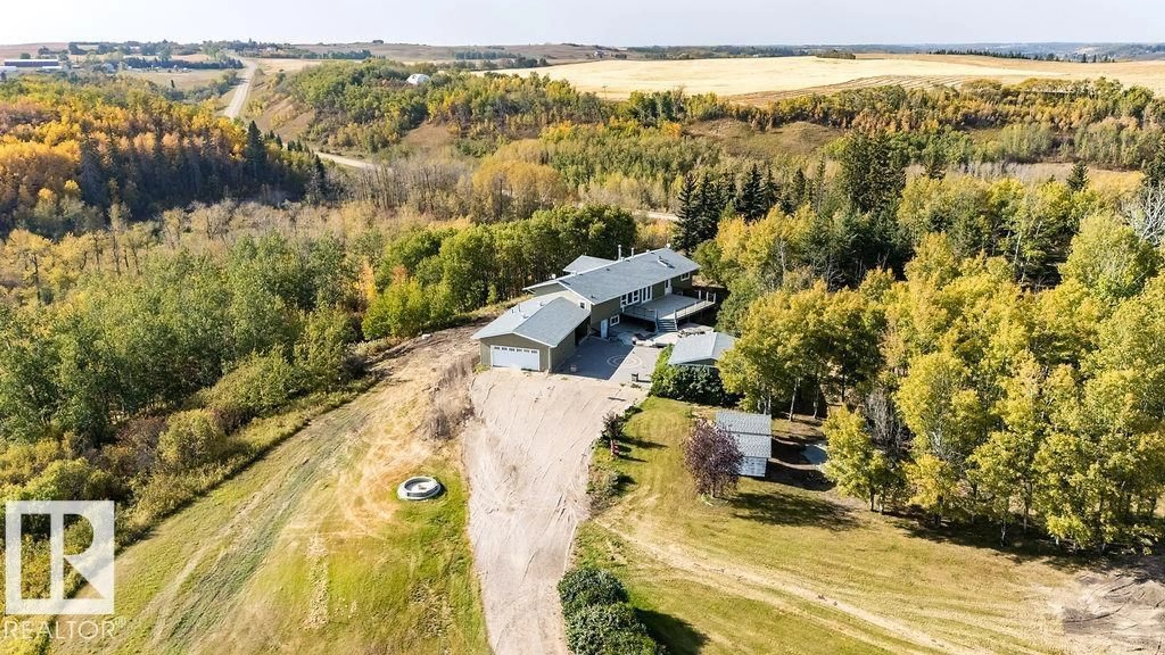 A pic from outside/outdoor area/front of a property/back of a property/a pic from drone, water/lake/river/ocean view for 224061 TWP ROAD 462, Rural Wetaskiwin County Alberta T9A1X1