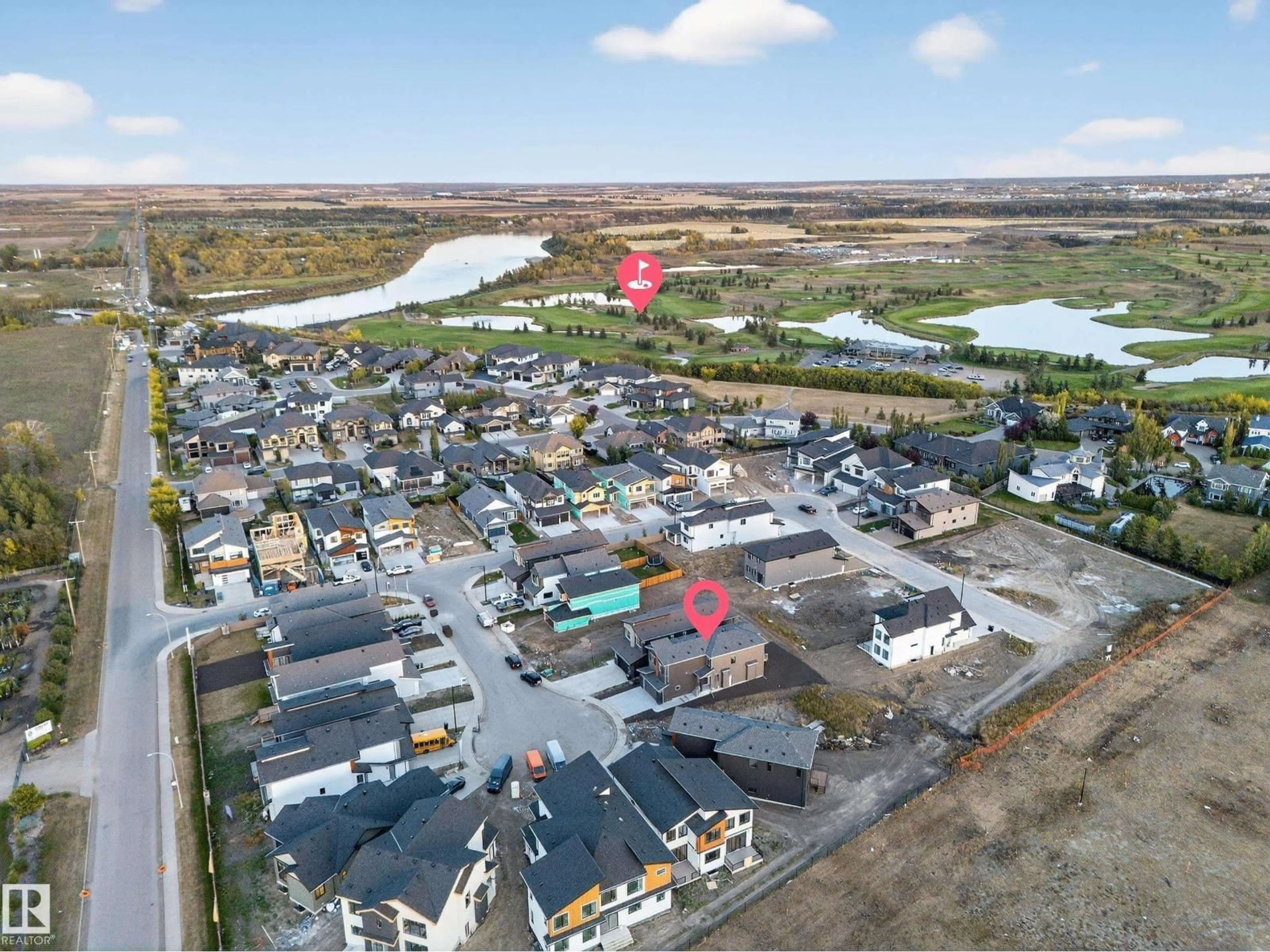 A pic from outside/outdoor area/front of a property/back of a property/a pic from drone, street for NE - 715 166 AV, Edmonton Alberta T5Y2Z6