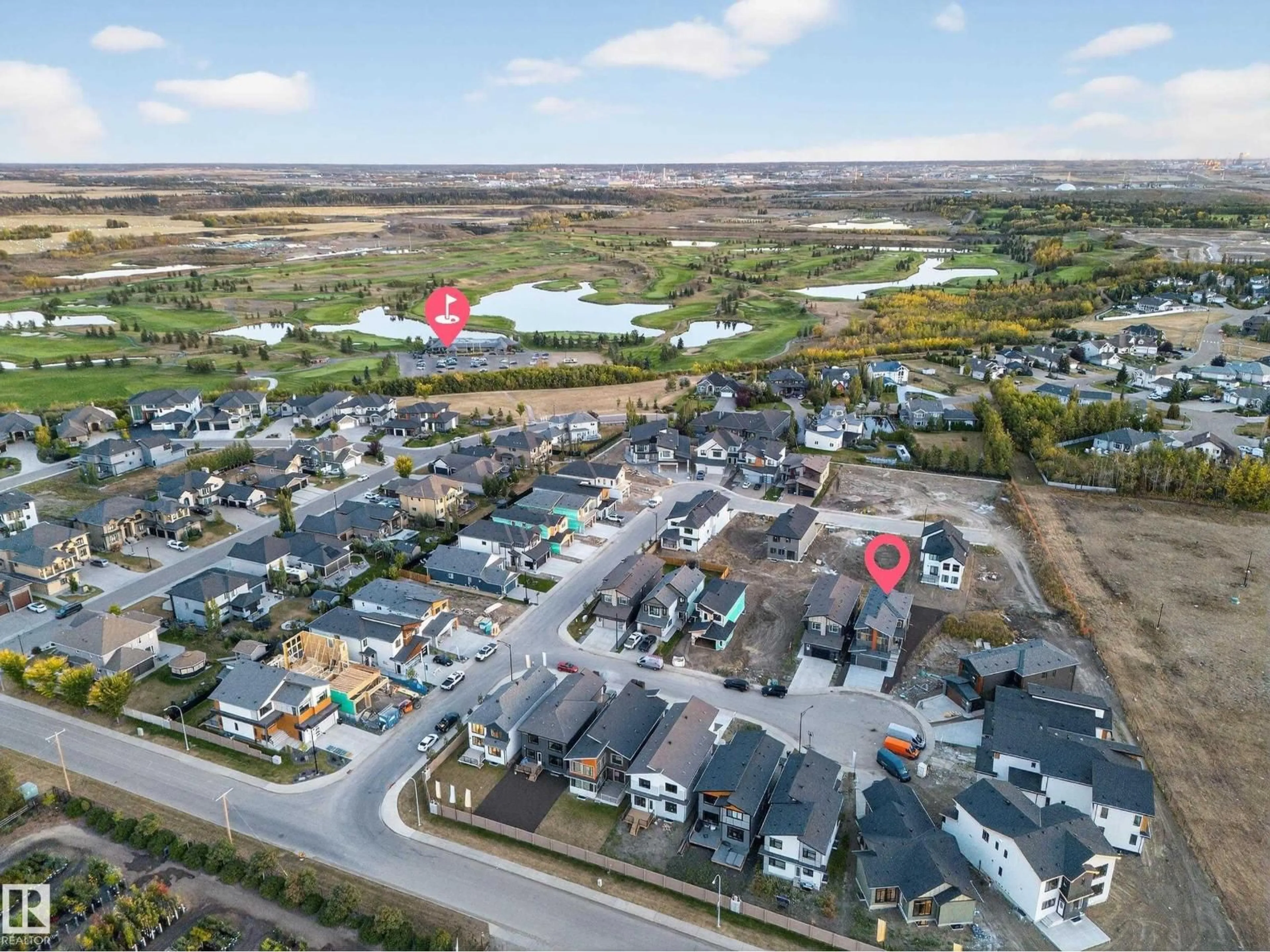 A pic from outside/outdoor area/front of a property/back of a property/a pic from drone, street for NE - 715 166 AV, Edmonton Alberta T5Y2Z6