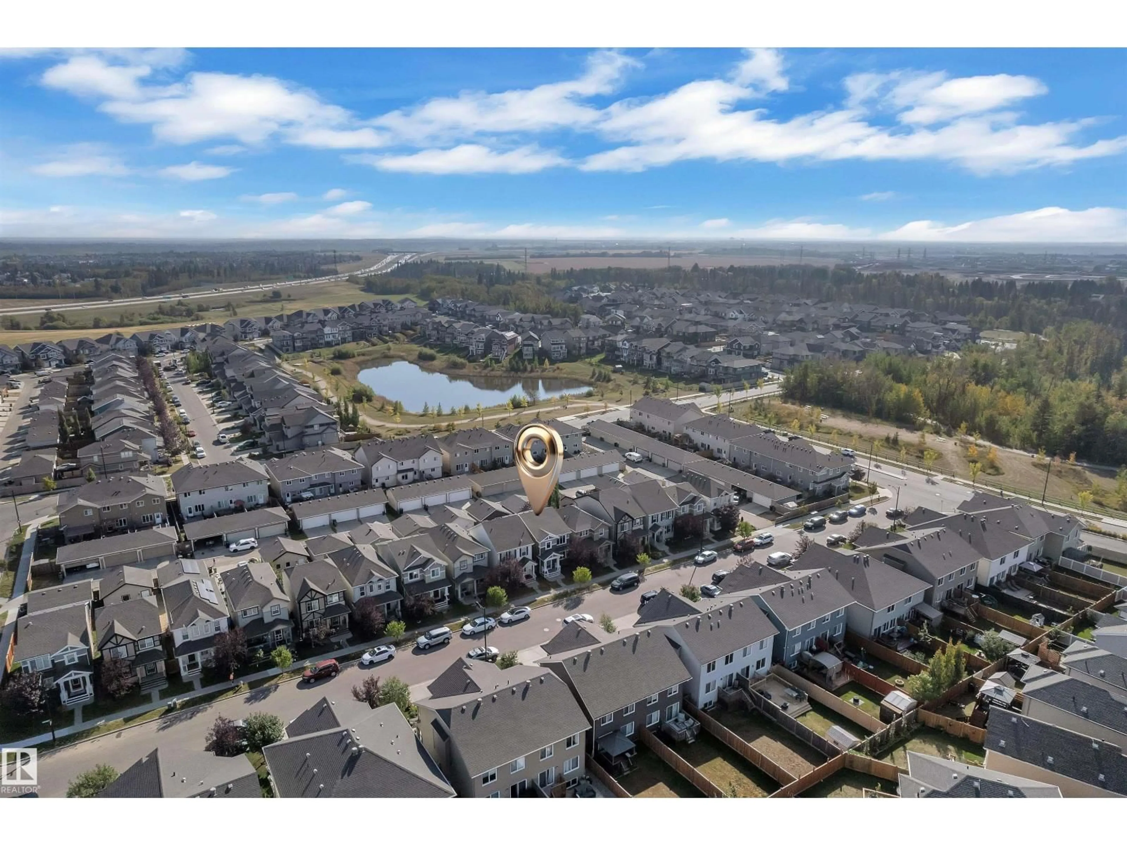 A pic from outside/outdoor area/front of a property/back of a property/a pic from drone, water/lake/river/ocean view for NW - 1025 EAST BEND BN, Edmonton Alberta T6M0V4