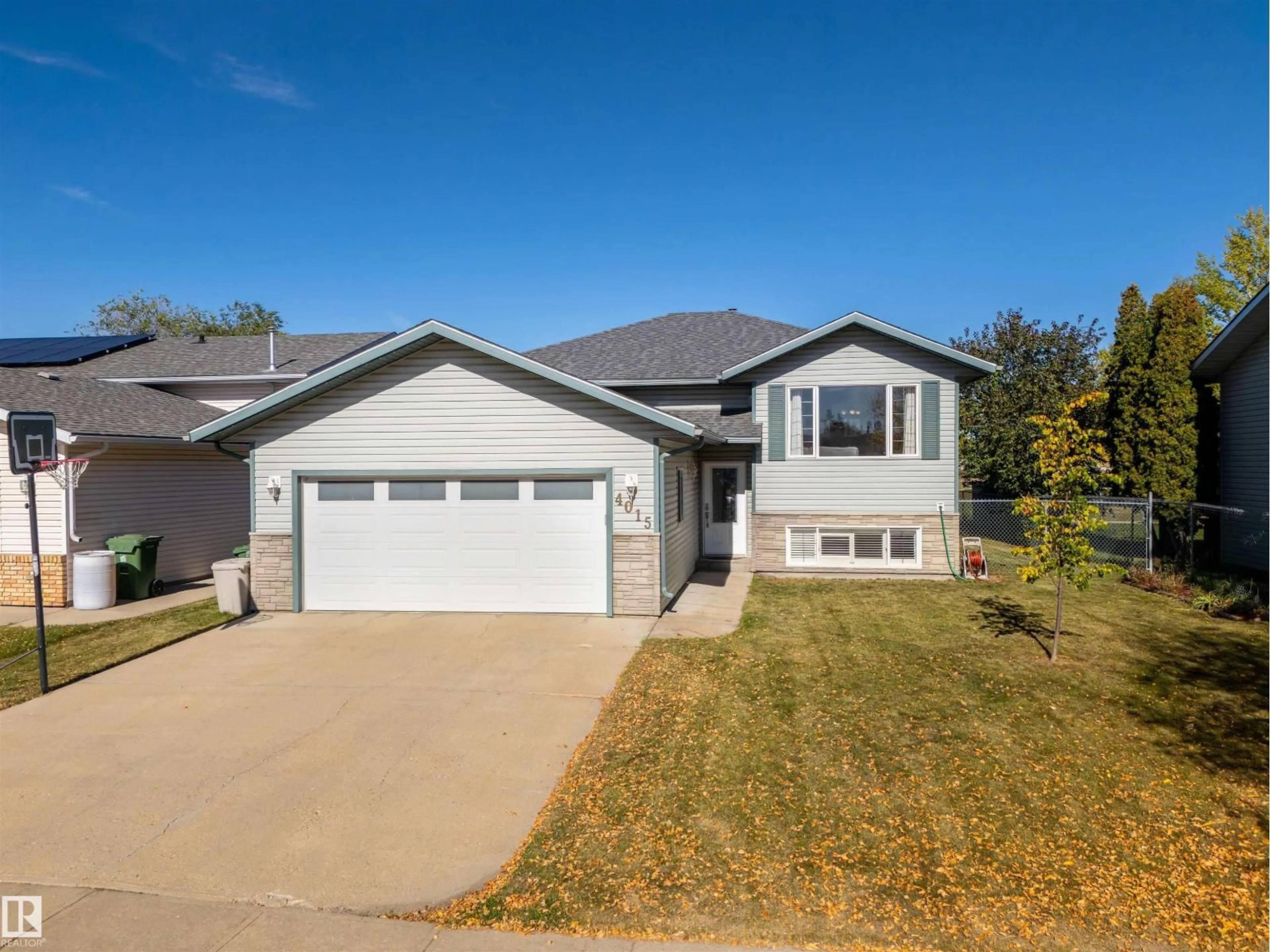 Home with vinyl exterior material, street for 4015 41 AV, Bonnyville Town Alberta T9N1T7
