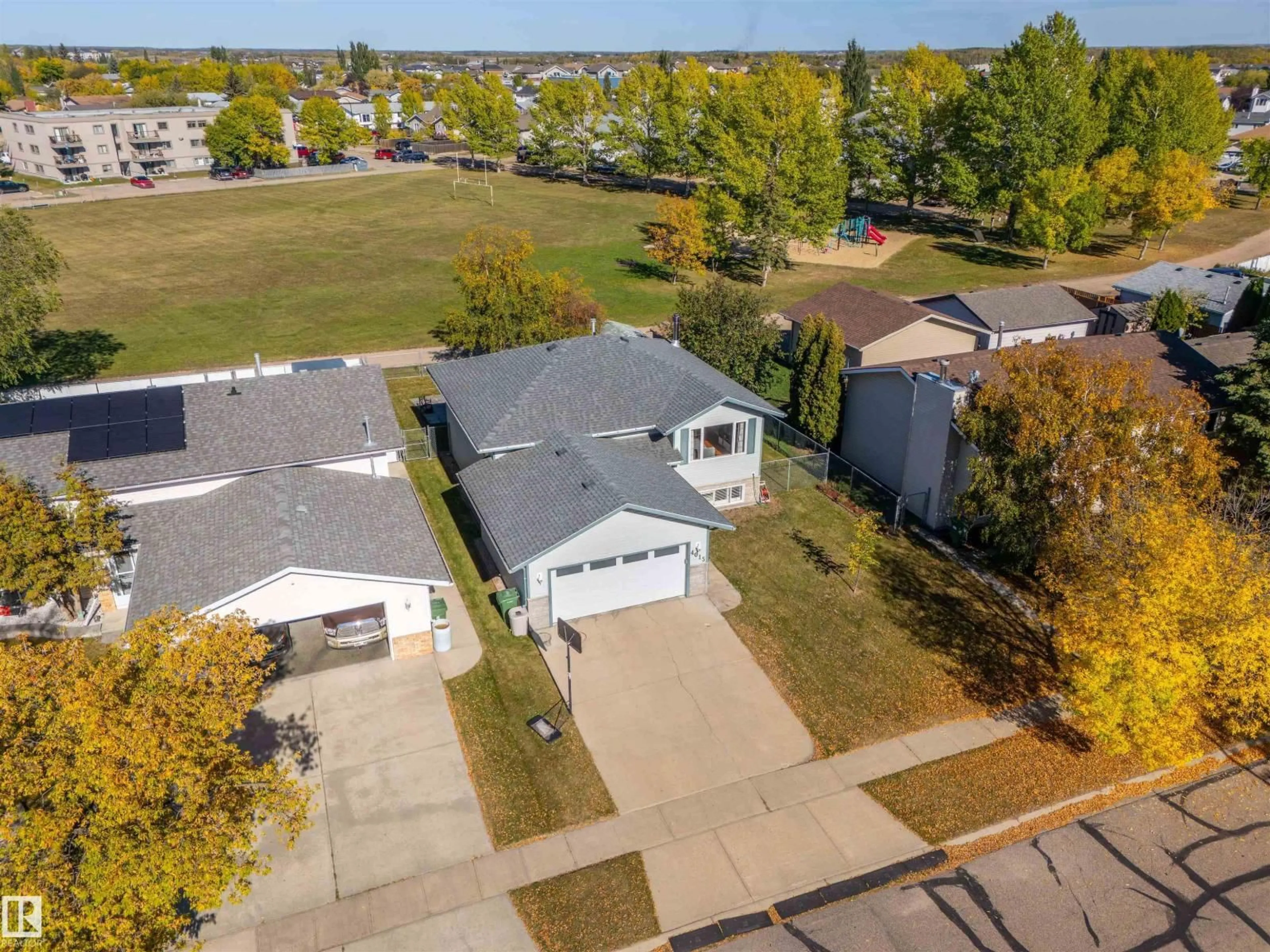 A pic from outside/outdoor area/front of a property/back of a property/a pic from drone, street for 4015 41 AV, Bonnyville Town Alberta T9N1T7