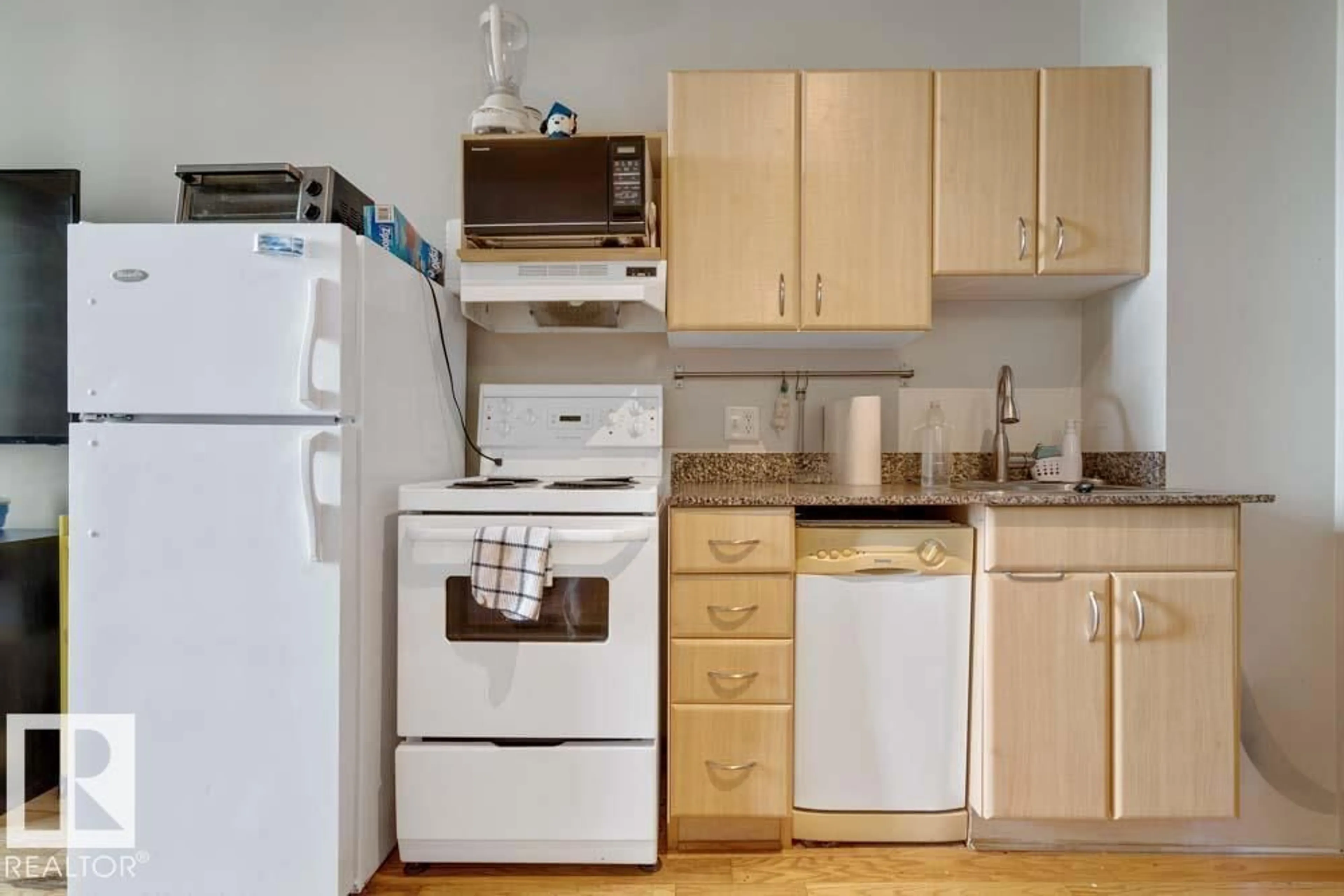 Standard kitchen, wood/laminate floor for 10024 NW - 710 JASPER AV, Edmonton Alberta T5J1R9